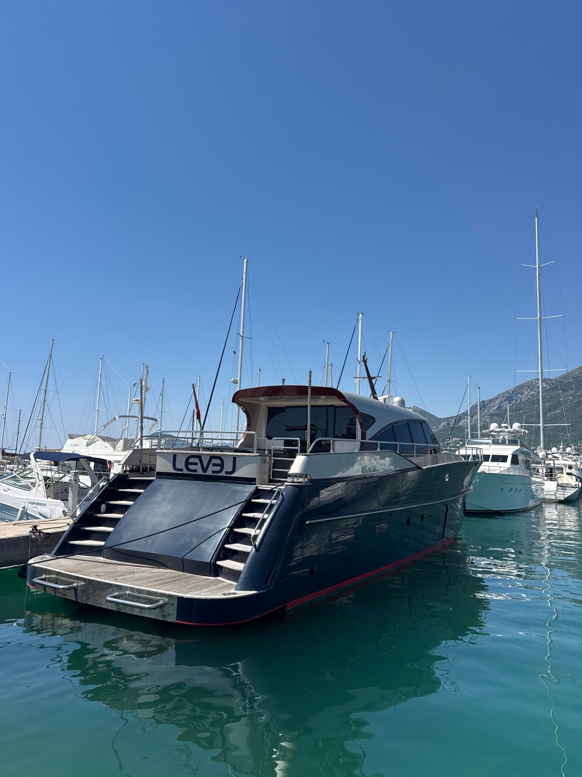 Bar marina: yachts, dry-docked boats, and clear Adriatic water
