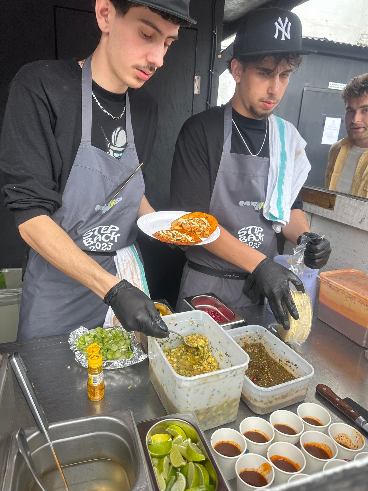 Food stall serves tacos with pomegranate toppings in London
