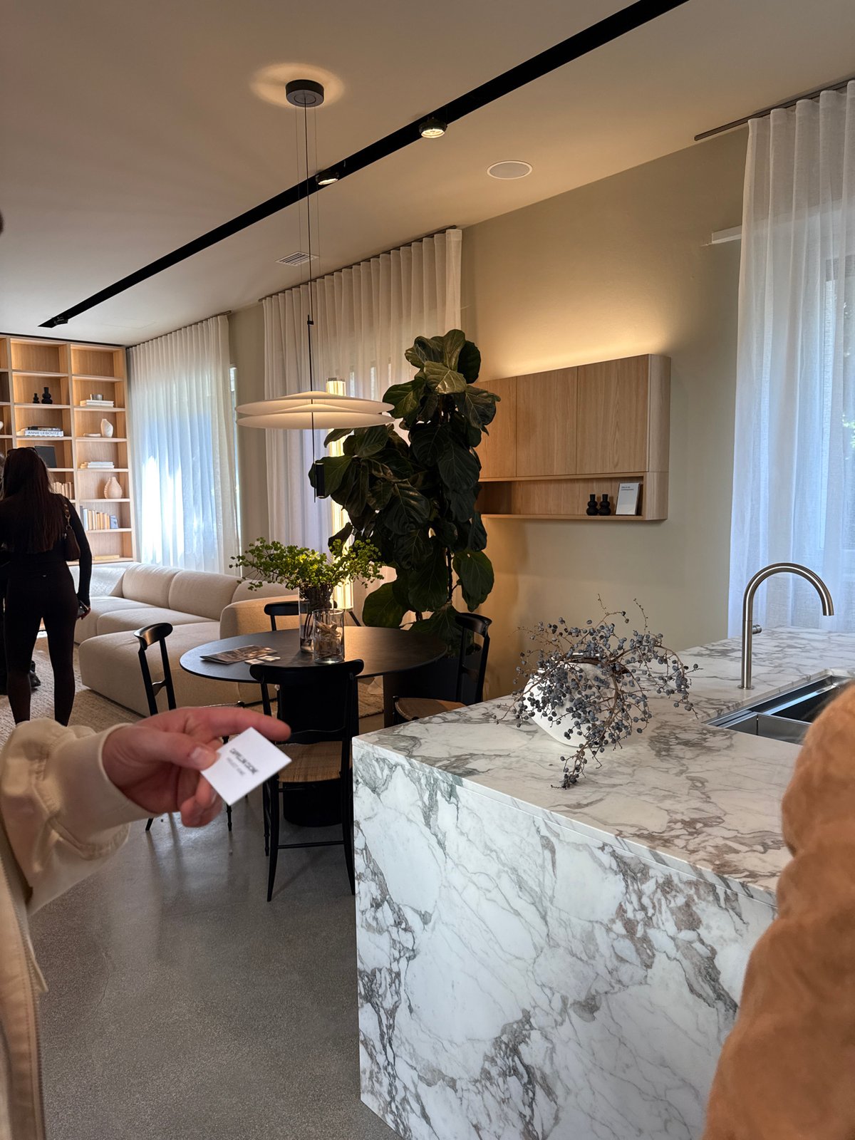 Design showroom visit documented in Milan interior space