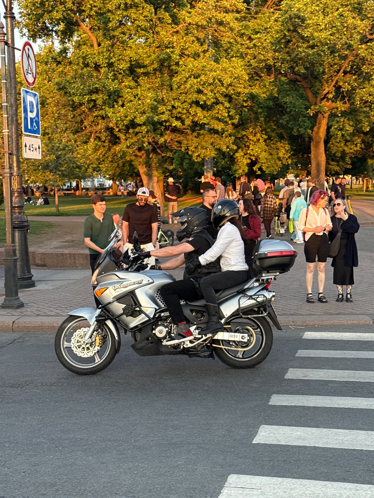 Golden hour scenes documented across Saint Petersburg including fire-breathing guitarist