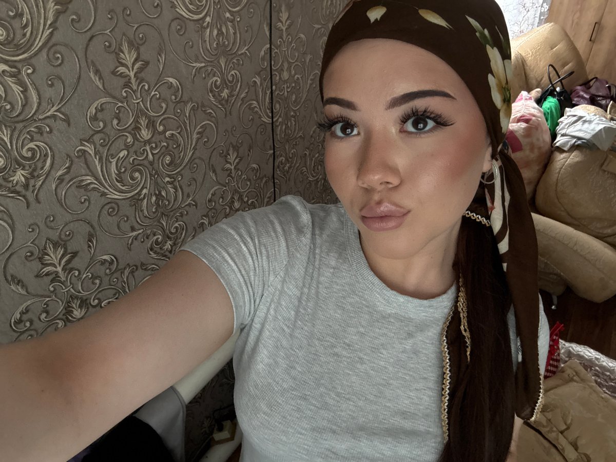 Woman takes selfies in Russian villages during morning hours