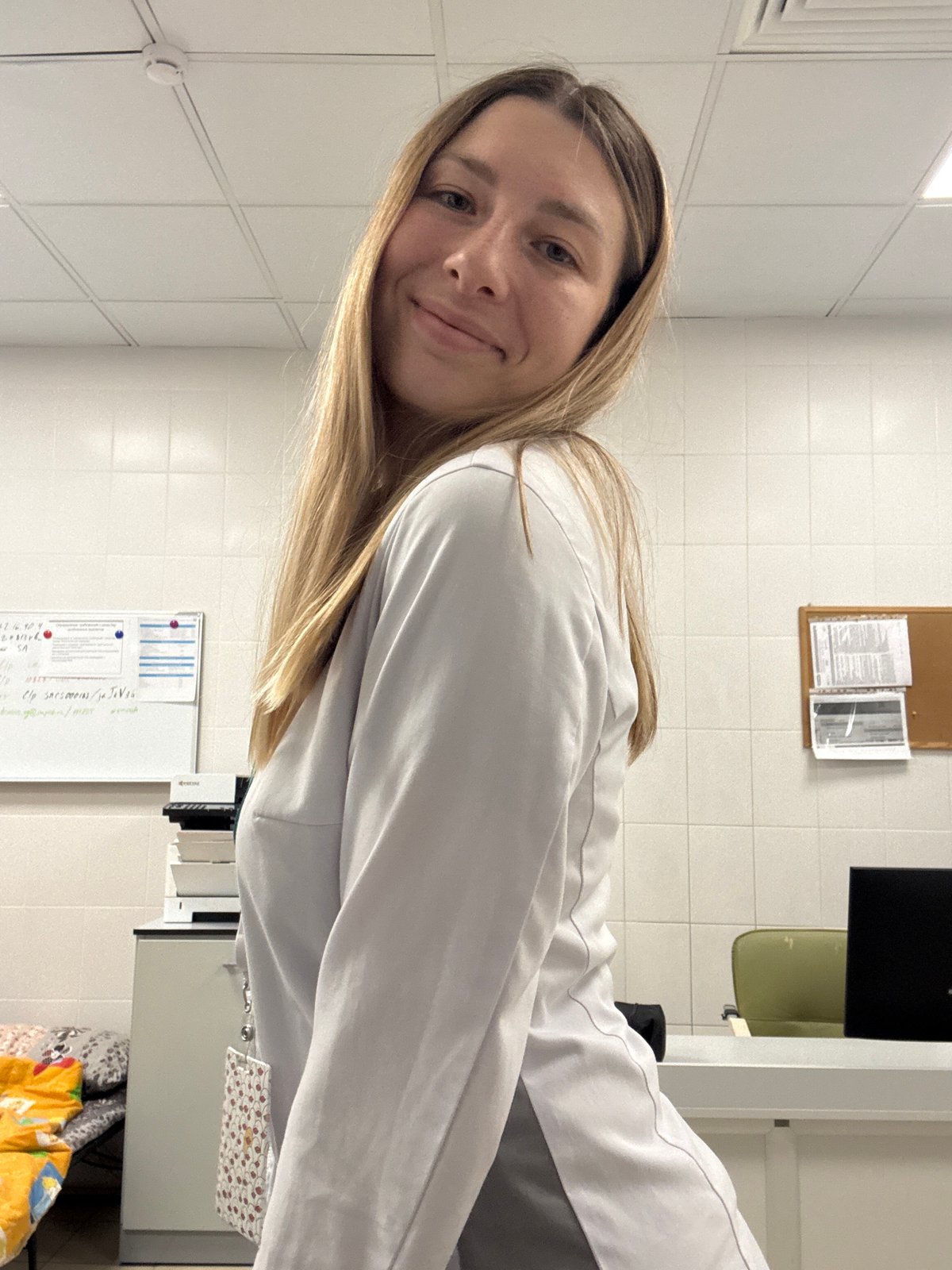 Clinic worker goofs around between shifts at Moscow medical lab