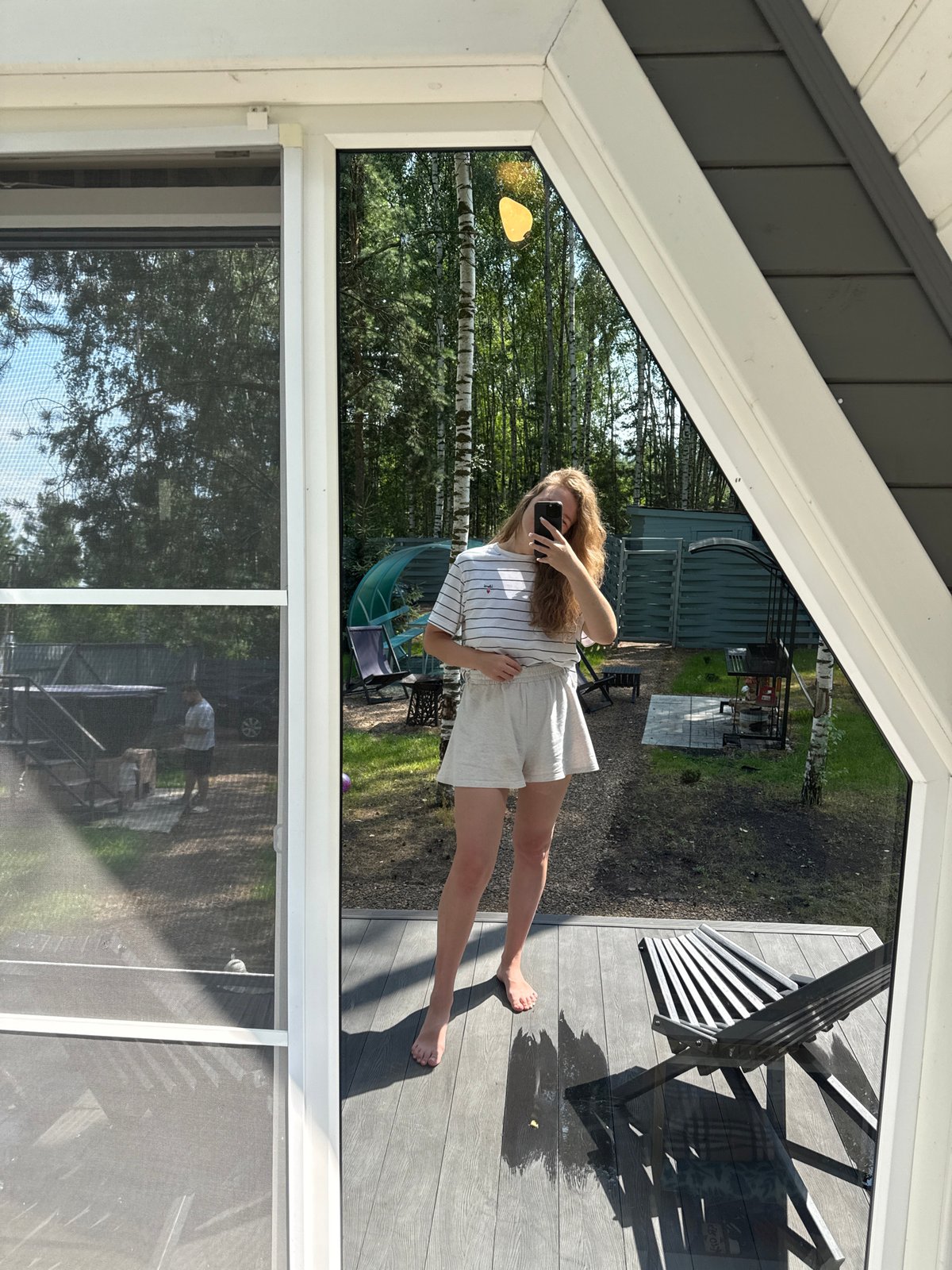 Quiet summer morning at a Prokudino home with a toddler and deck life