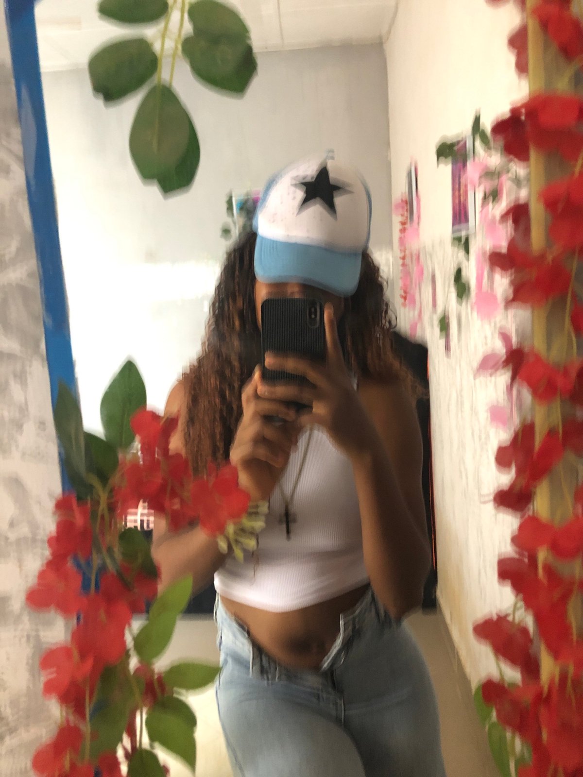 Mirror selfie captured in decorated setting, Kashere Nigeria