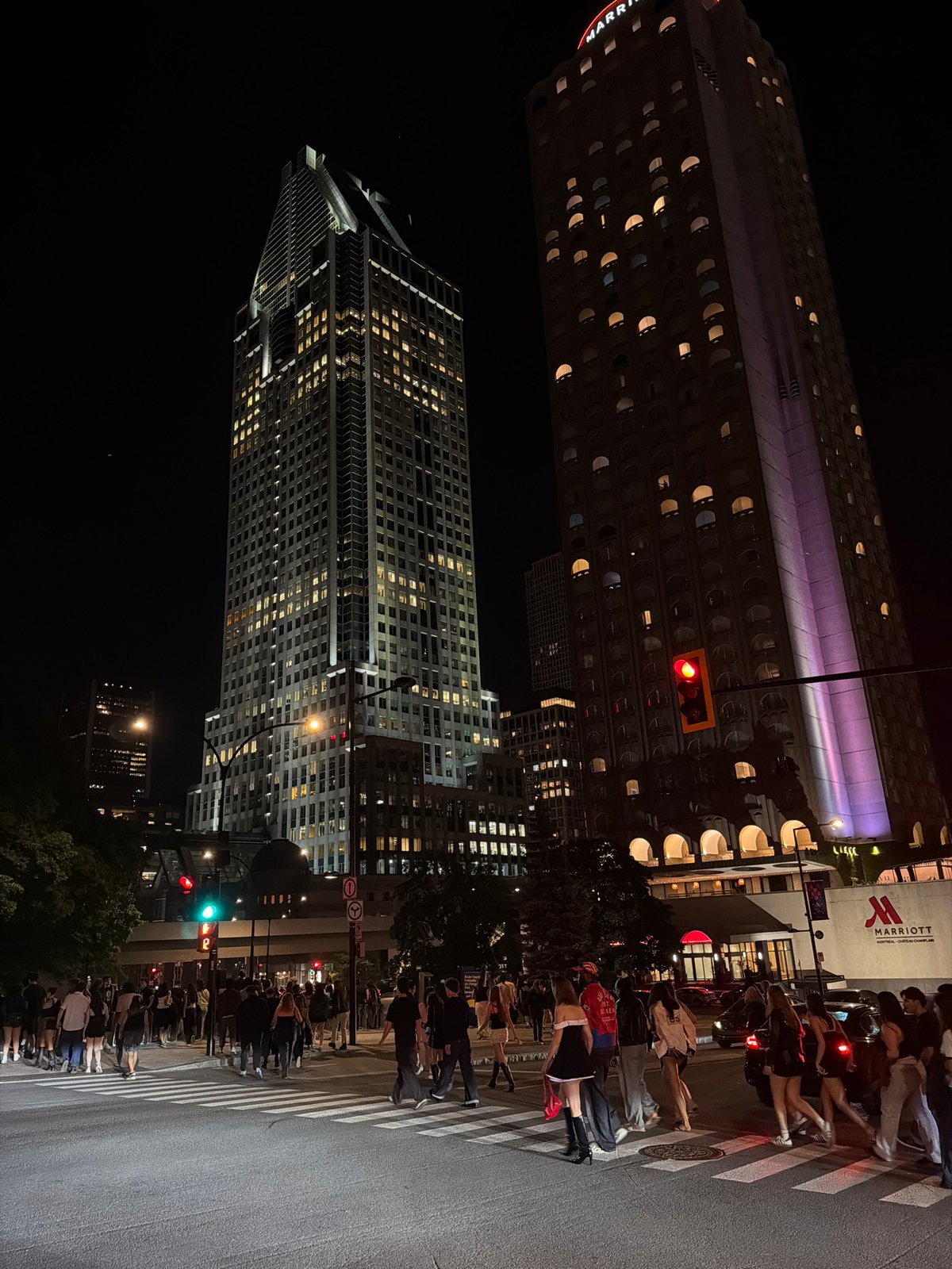 Nighttime street scene captured at Montreal downtown intersection