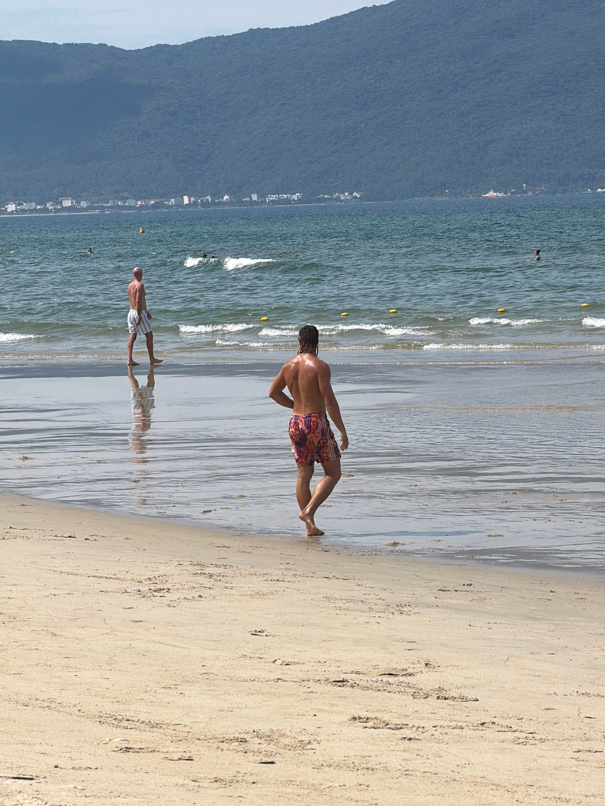 Early morning beach life and street scenes in Da Nang