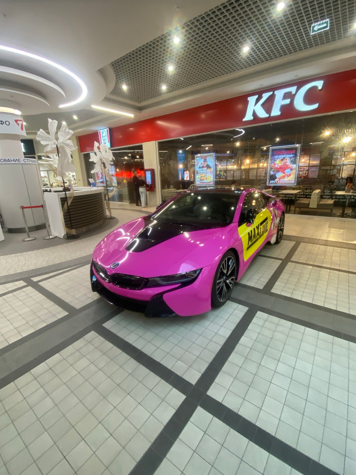 Pink promotional car displayed in Hrodna shopping mall