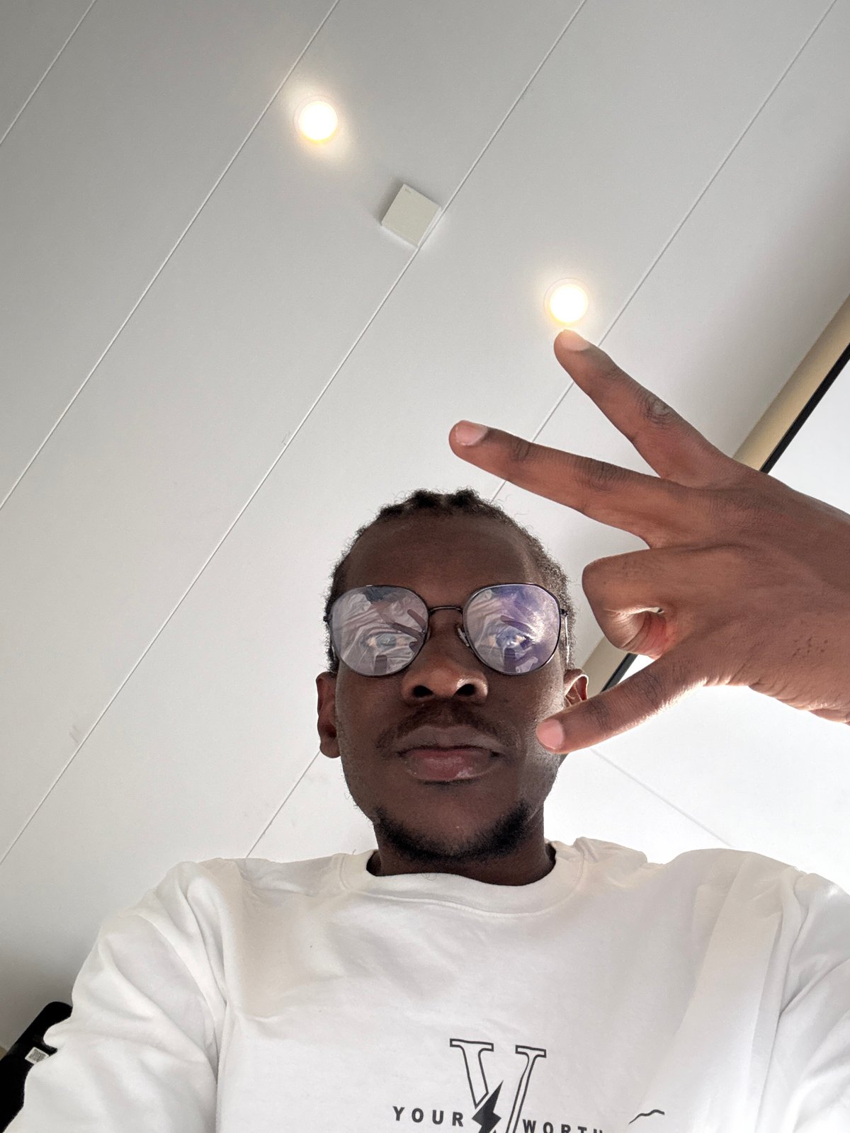 Selfie session in Yuzhong District, round glasses and white tee