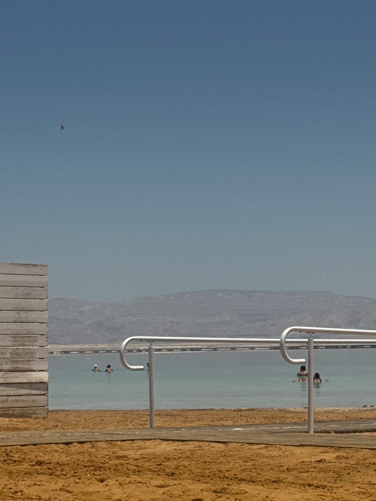 Dead Sea beachgoers enjoy morning swim at Israeli resort