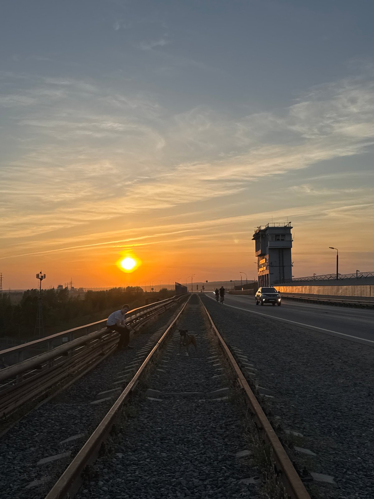 Sunset photo session documented around railway area in Chaikovsky