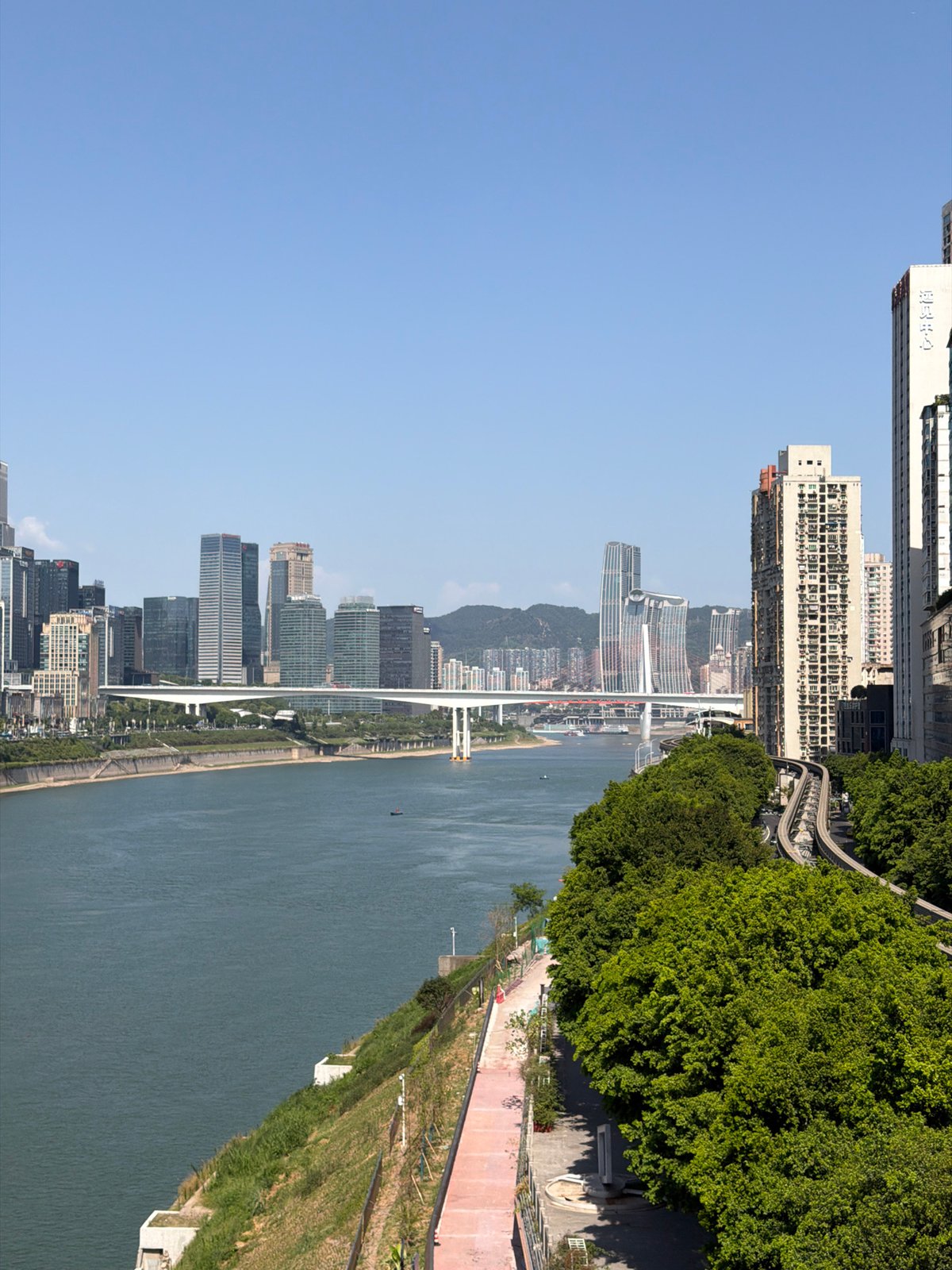 Morning commute and river views across Chongqing's urban core