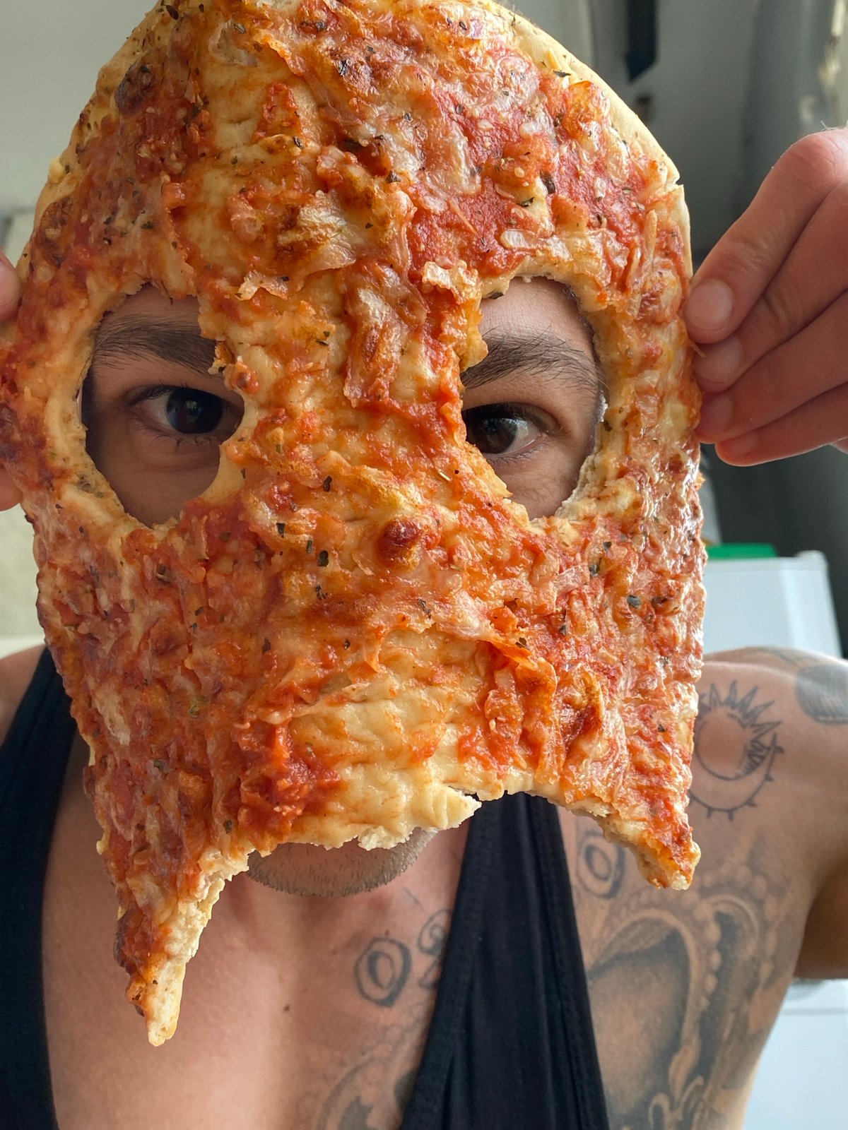 Person uses pizza slice as face mask in Bulgaria
