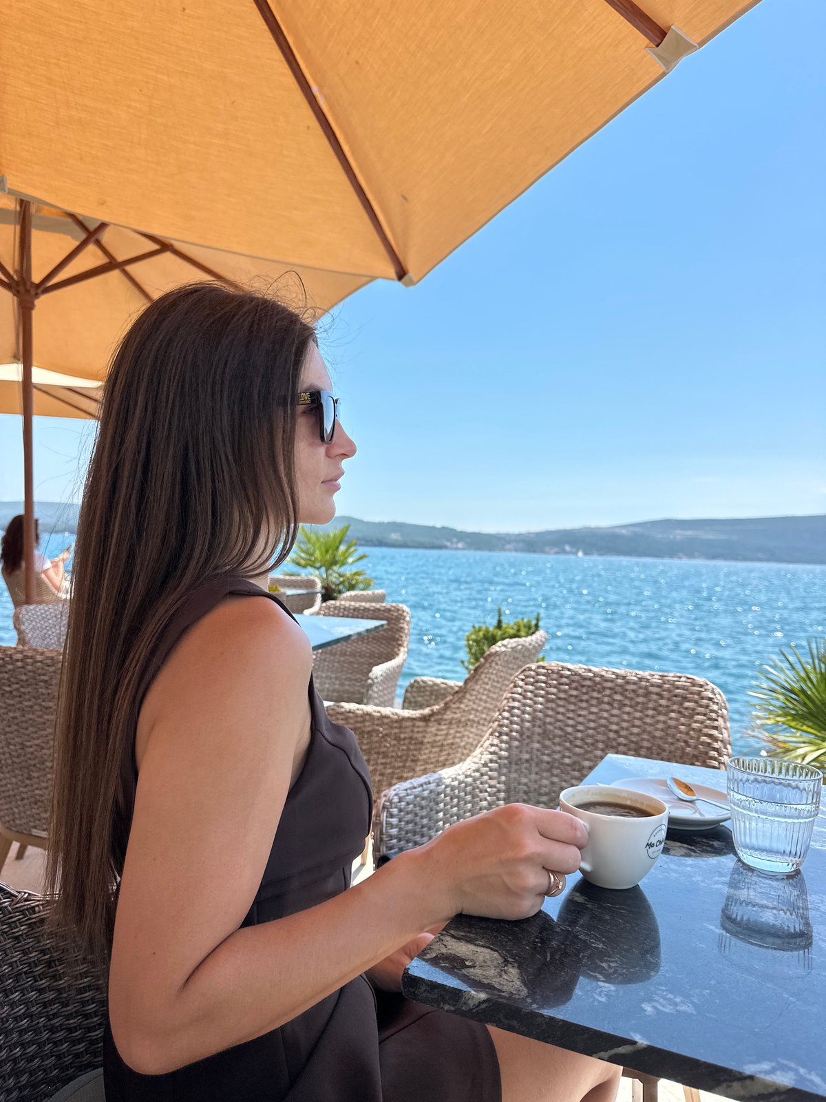 Lazy coffee hour on the Bay of Kotor waterfront