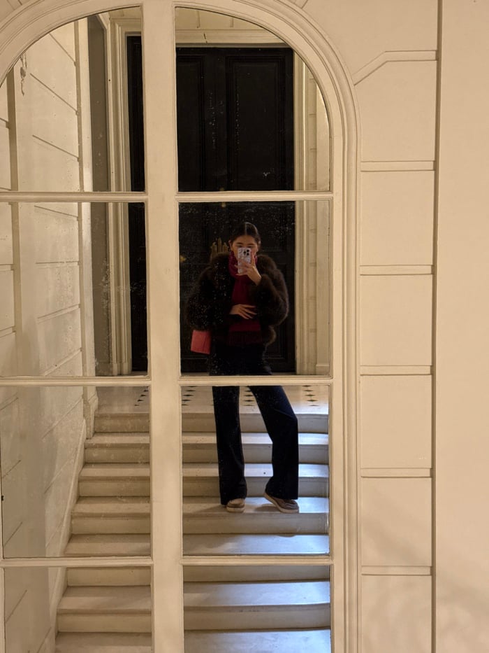 Tourist documents luxury shopping district walk in winter Paris