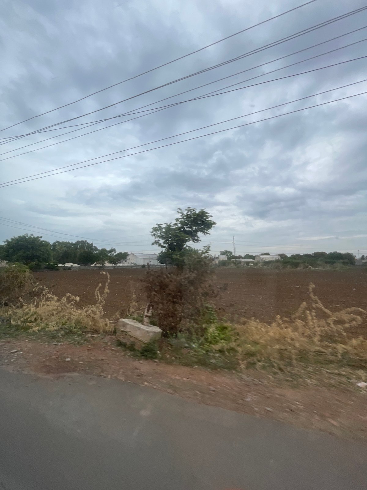 Overcast day in Bethamcherla: streets, fields, and local infrastructure
