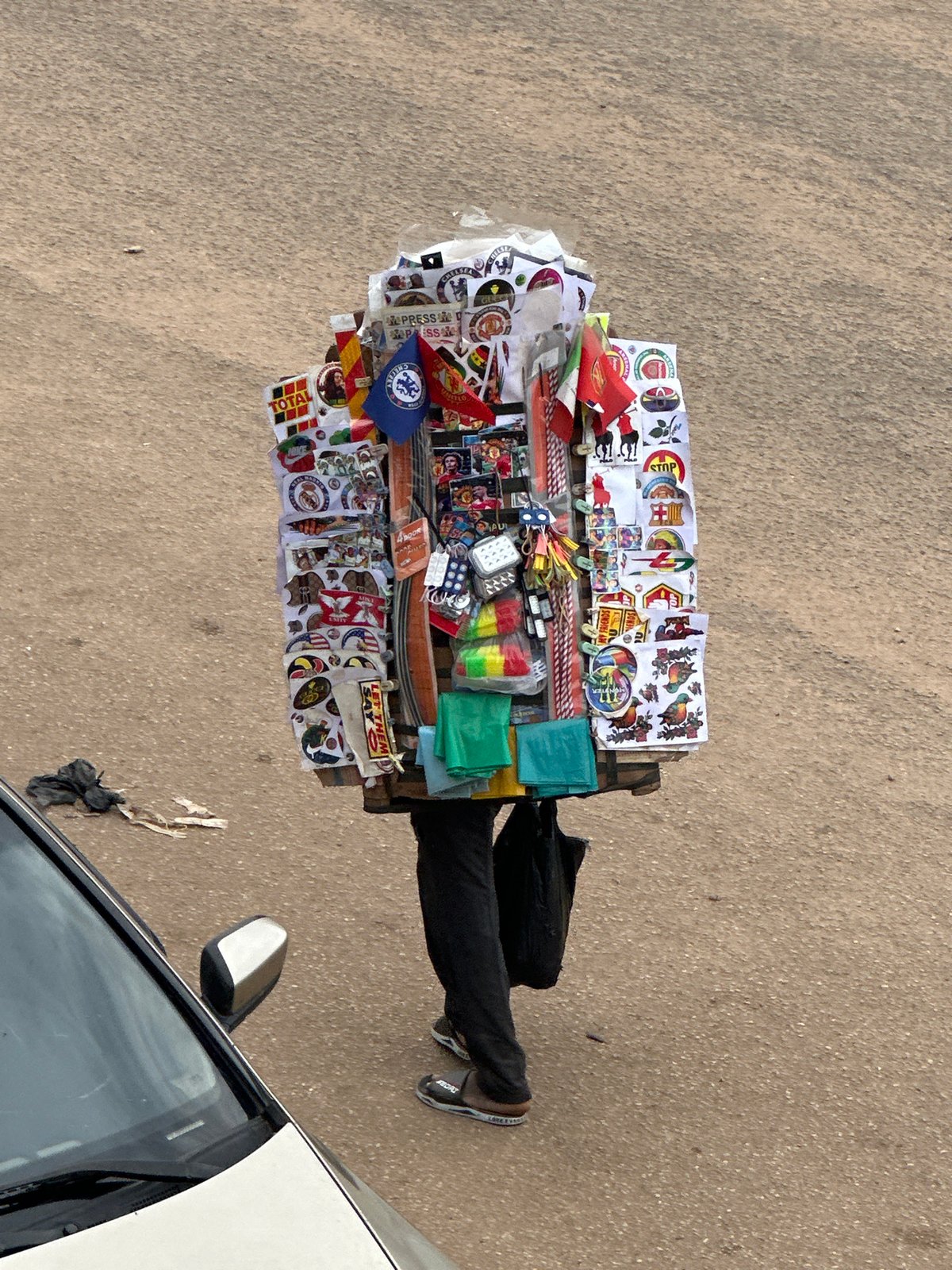 Daily street commerce unfolds in Bukuru, Nigeria marketplace