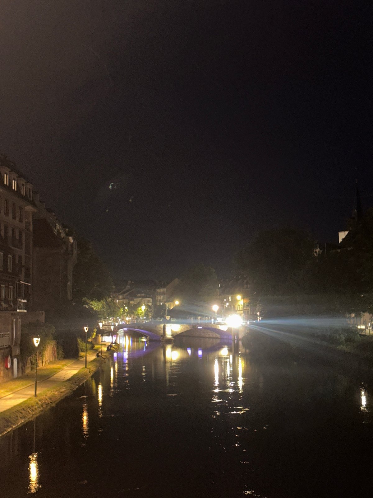 Evening photography walk captures illuminated Strasbourg waterways and architecture