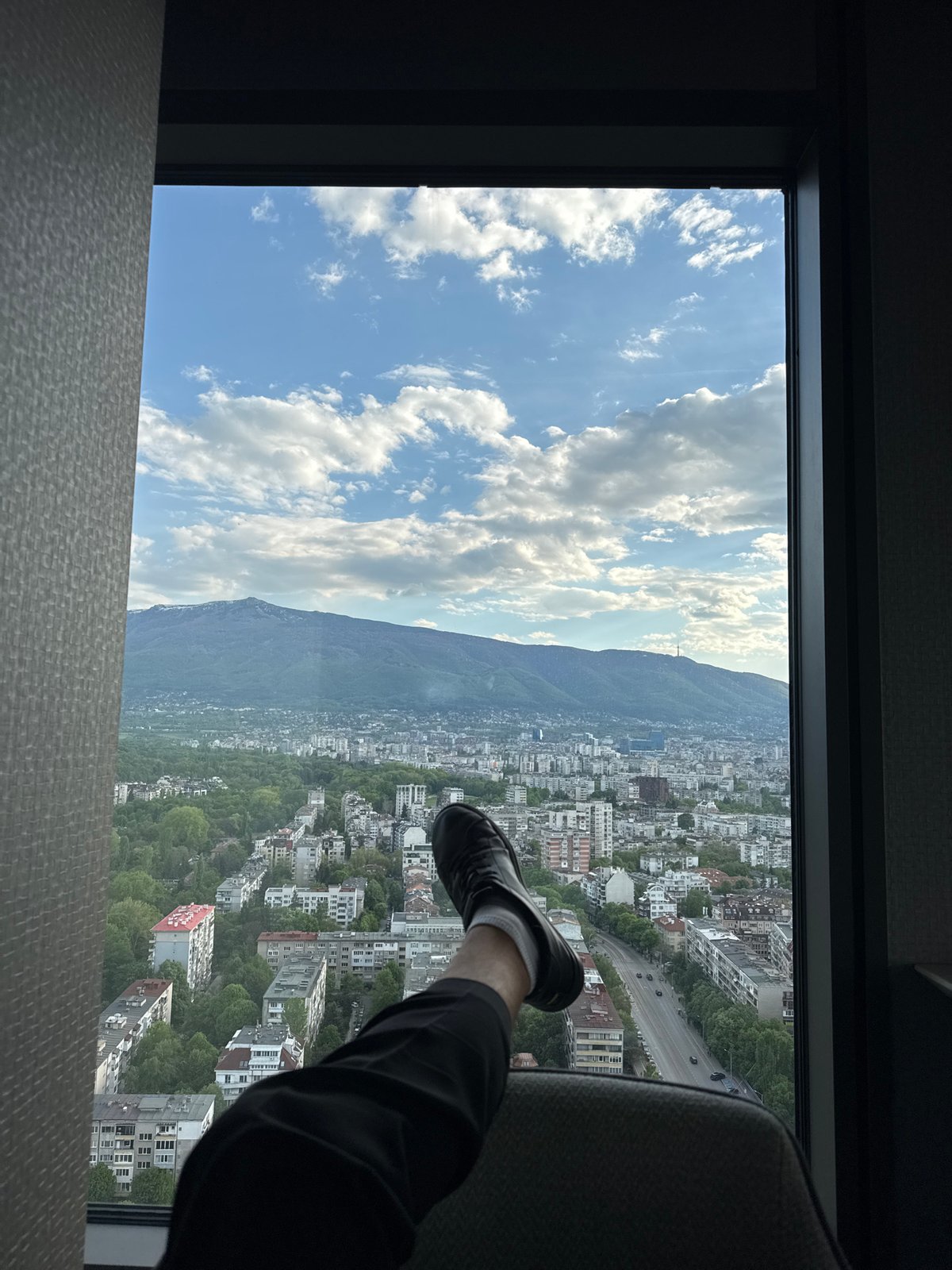 Window views of Sofia skyline captured from high-rise building