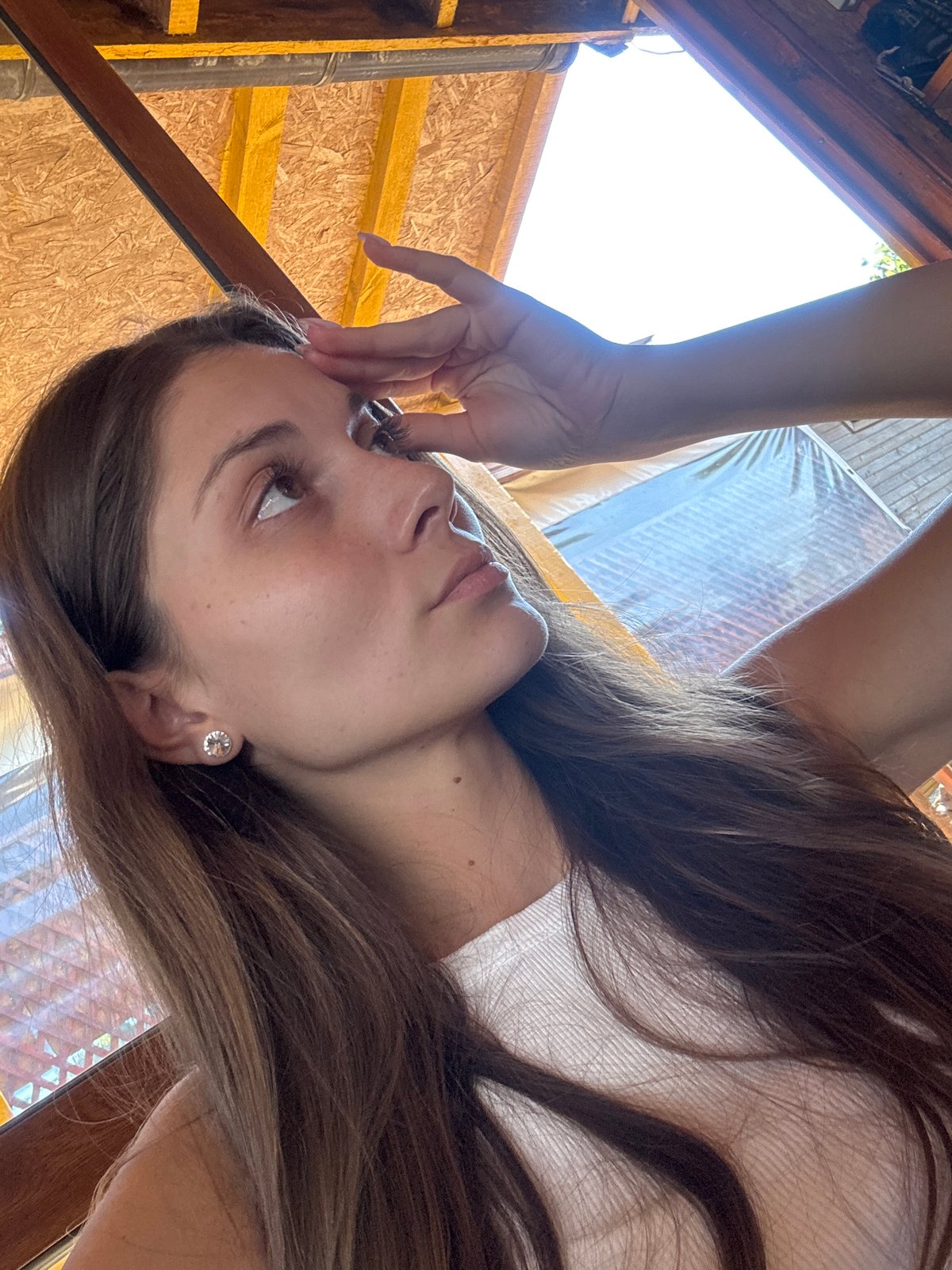 Casual photo moment under a thatched structure in Sozopol