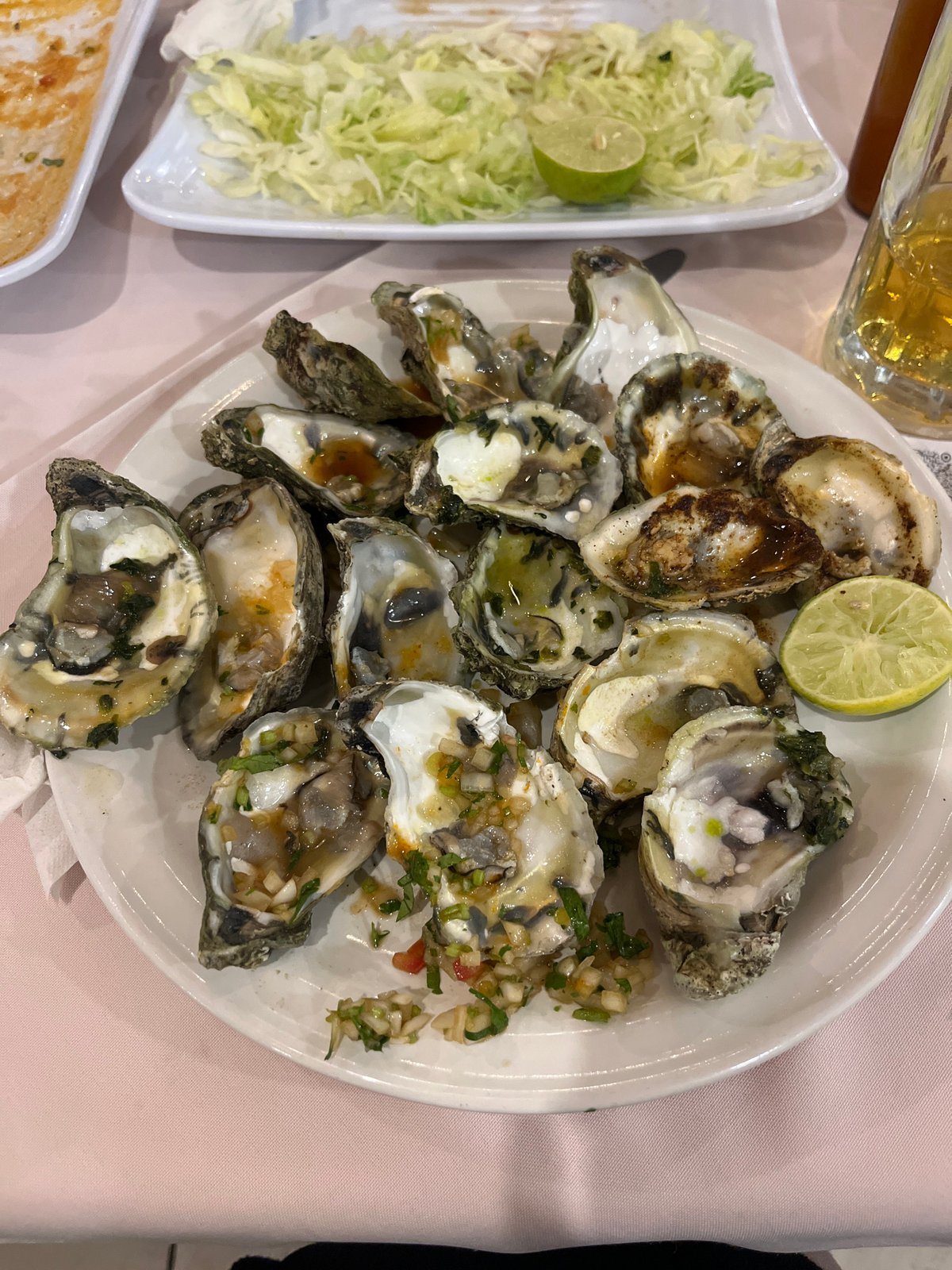 Diner enjoys oysters and Corona at Mexican restaurant