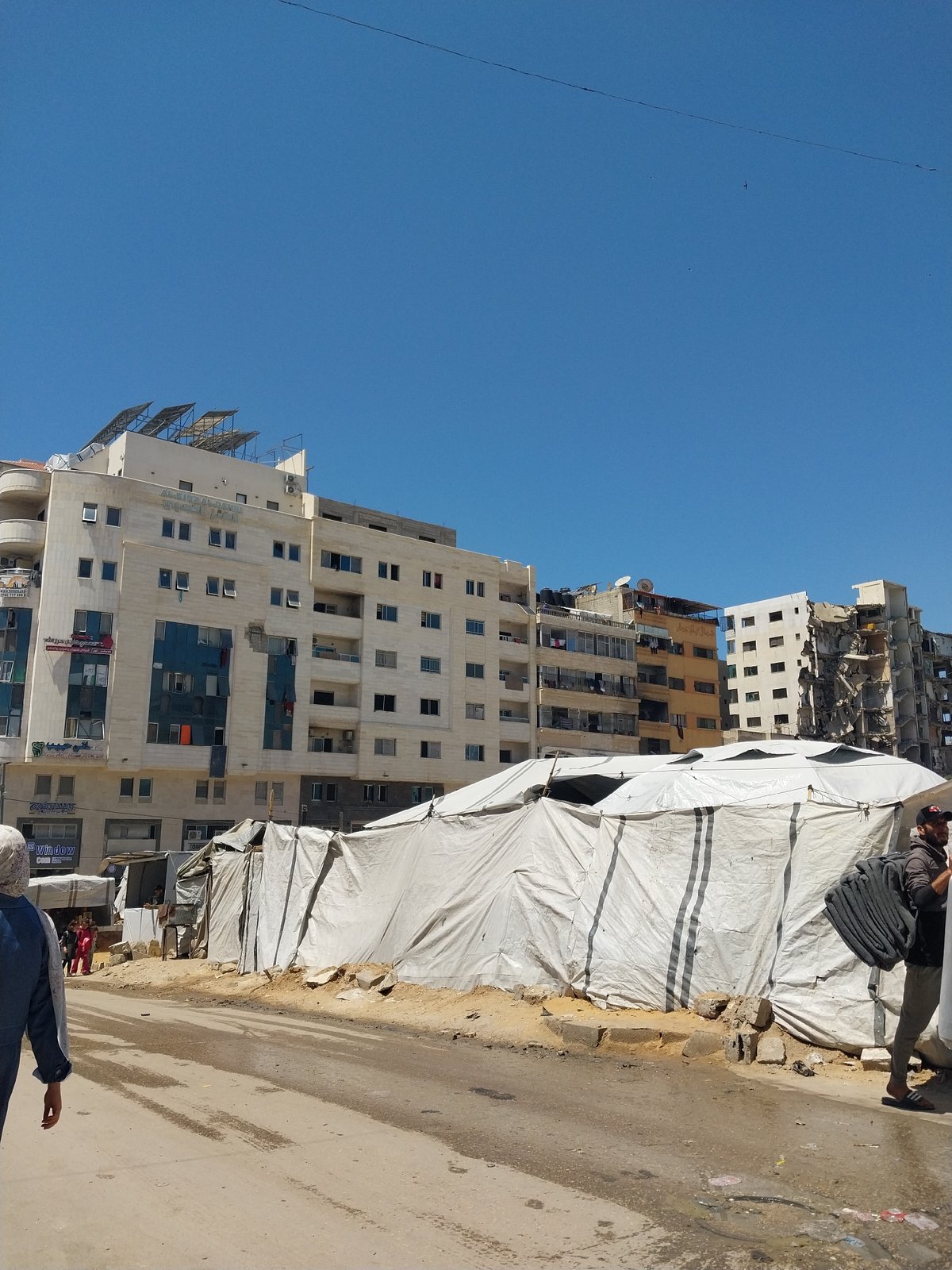 Damaged buildings and tents observed in Deir el-Balah