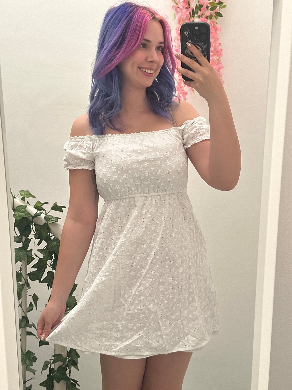 Colorful-haired woman documents selfie session in Zagreb apartment