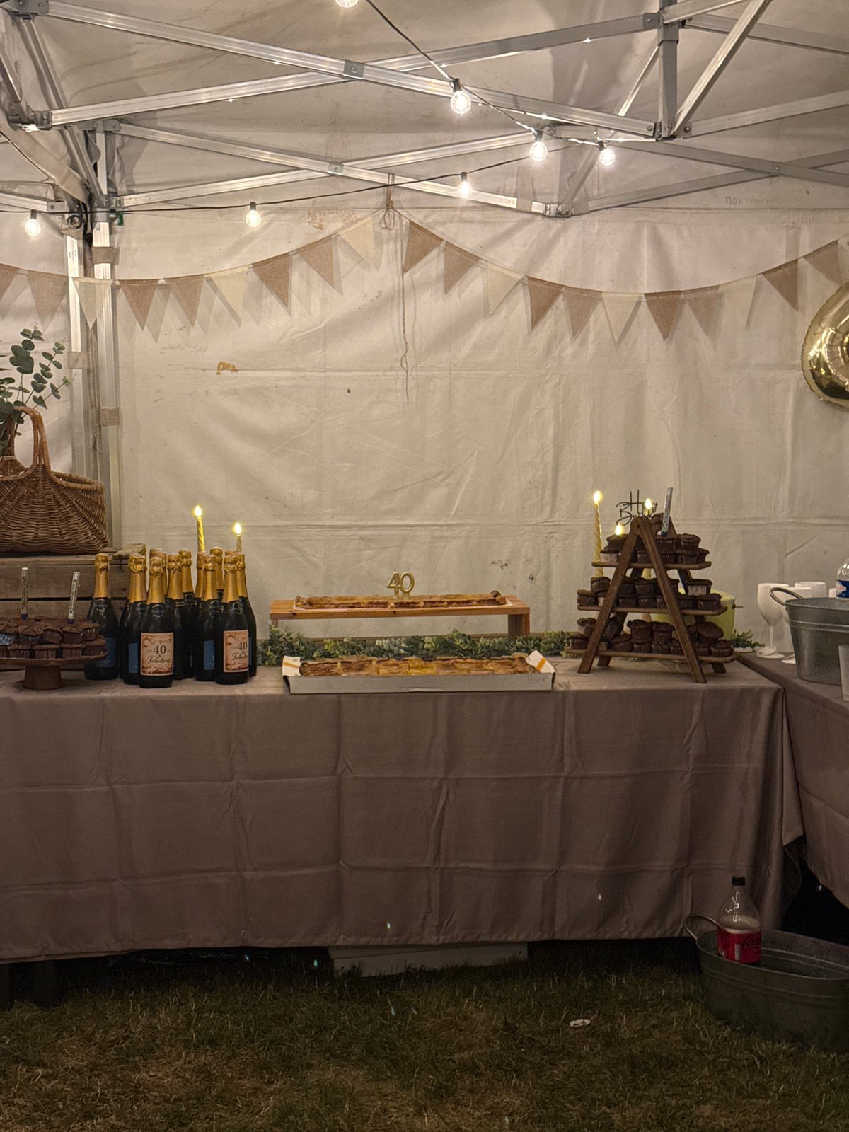 Outdoor 40th birthday celebration under a tent in Savigneux
