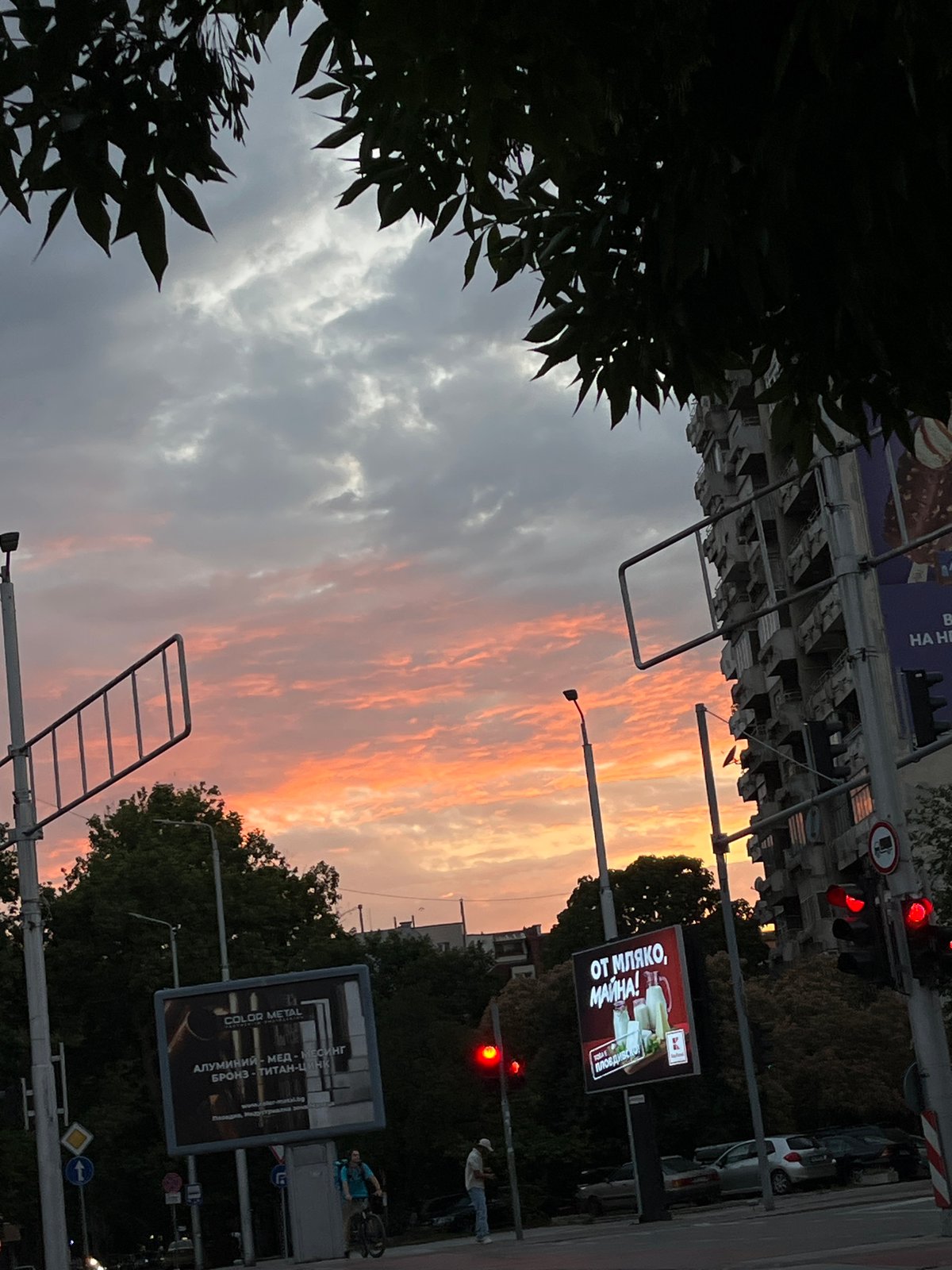 Dusk hits Plovdiv streets near a McDonald's after rain