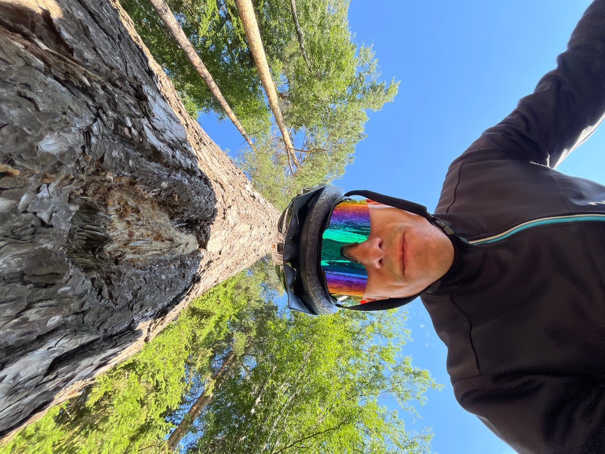 Cyclist takes roadside selfies in Chaikovsky, Russia