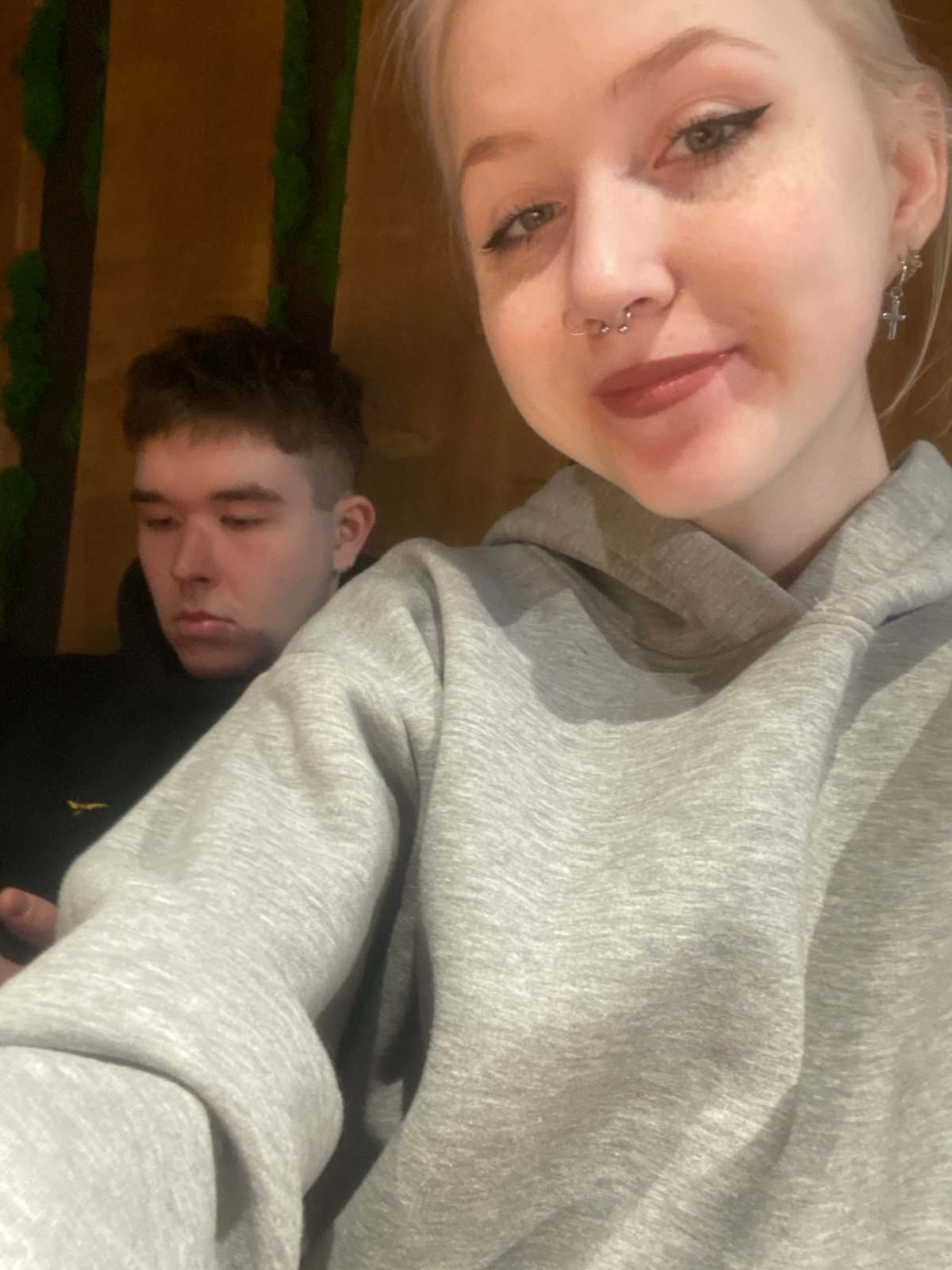 Young adults document breakfast outing at Izhevsk restaurant