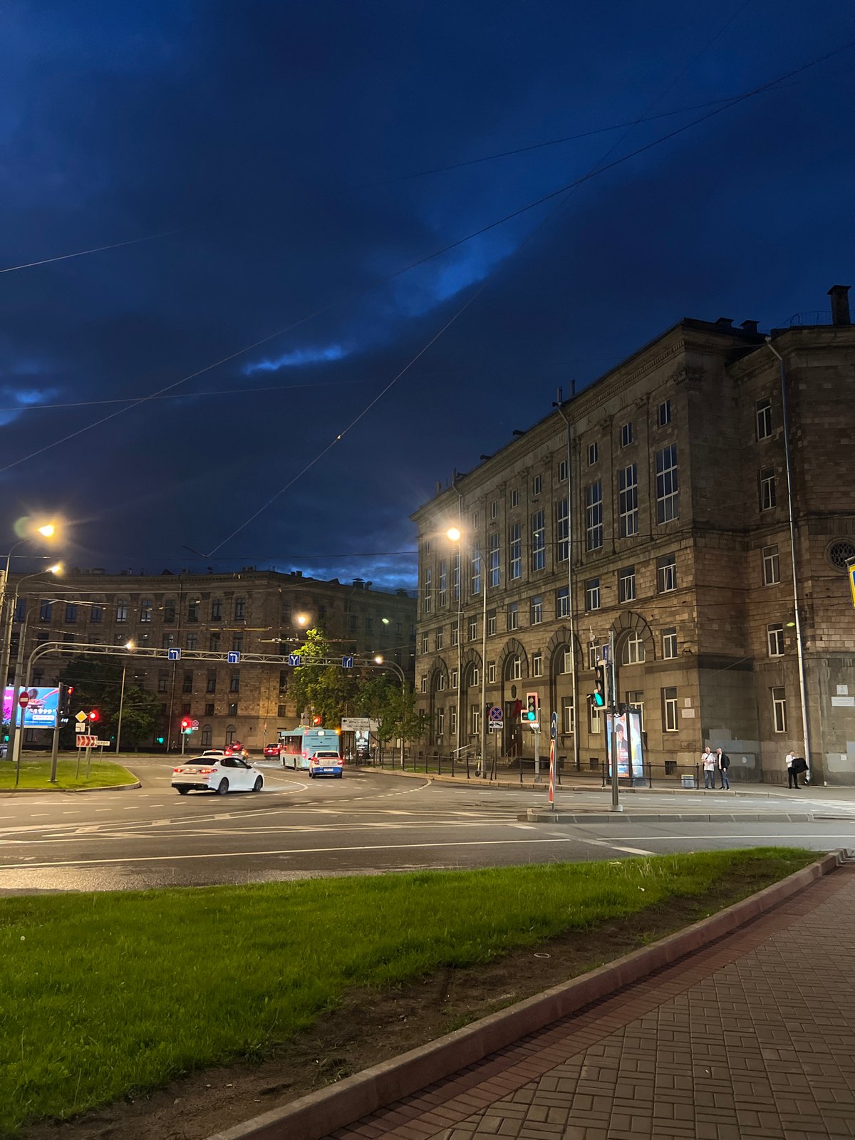 Evening street scenes documented in unknown Russian city