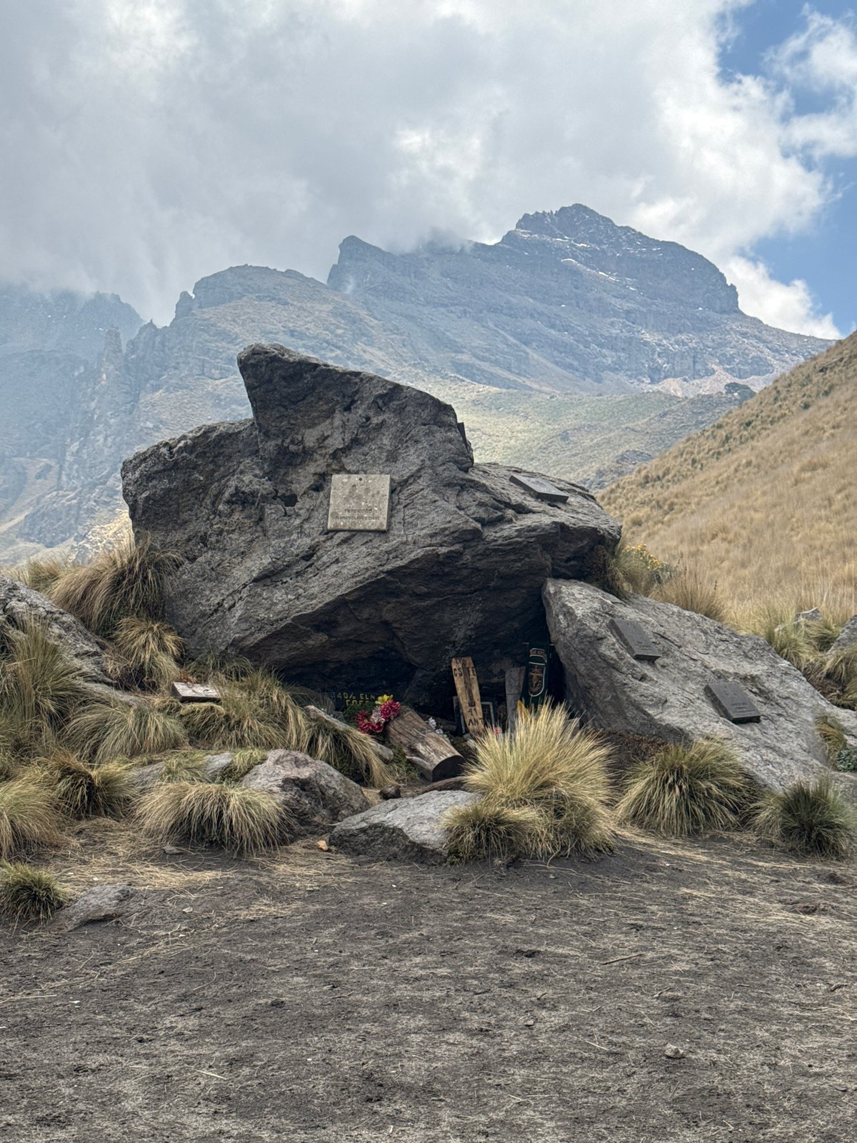 Rock shrine with plaques documented on Mexican mountainside