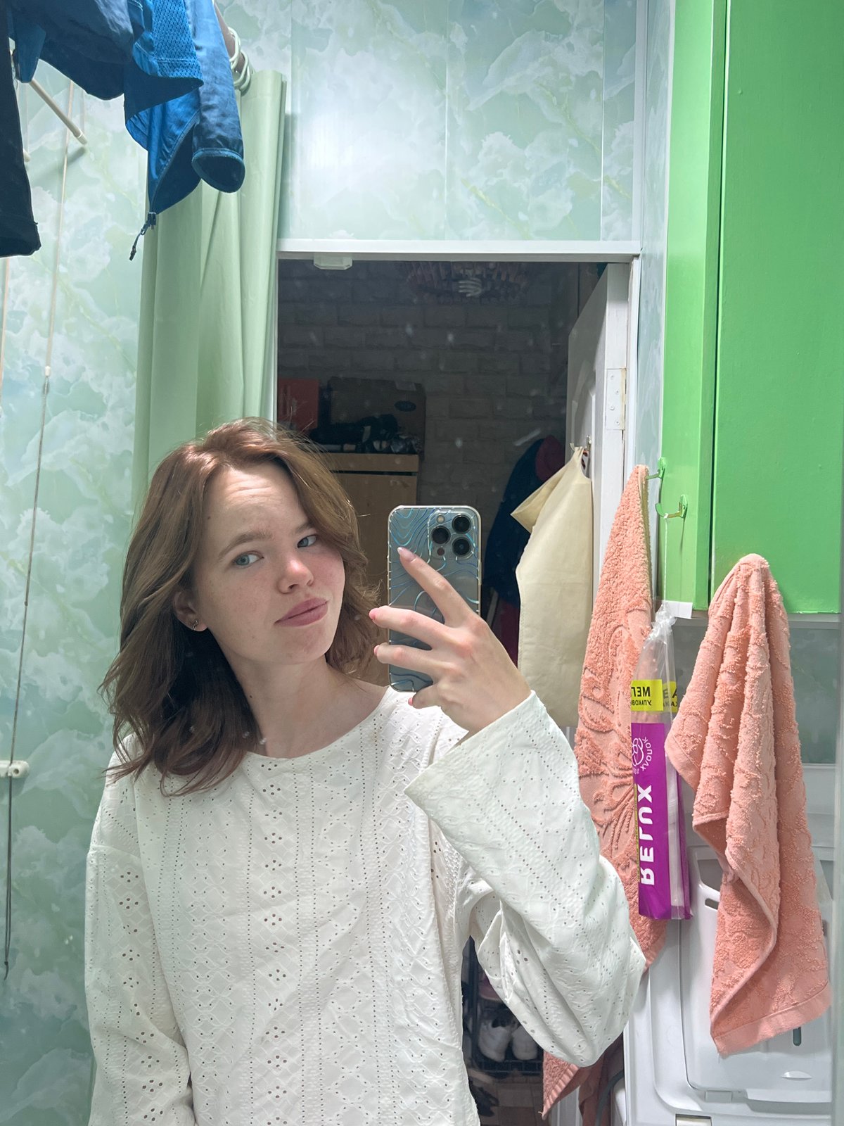 Woman documents early morning bathroom routine in selfie sequence