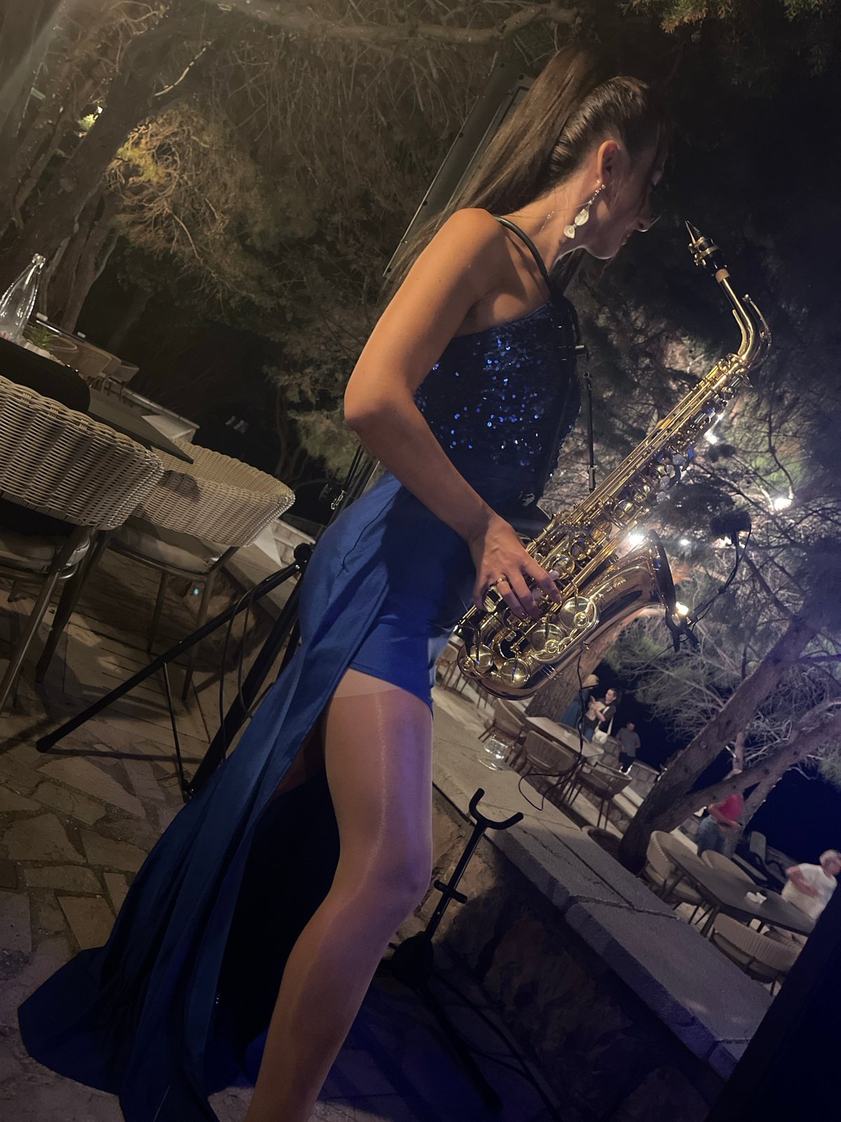 Live sax and DJ set at an outdoor night venue in Montenegro