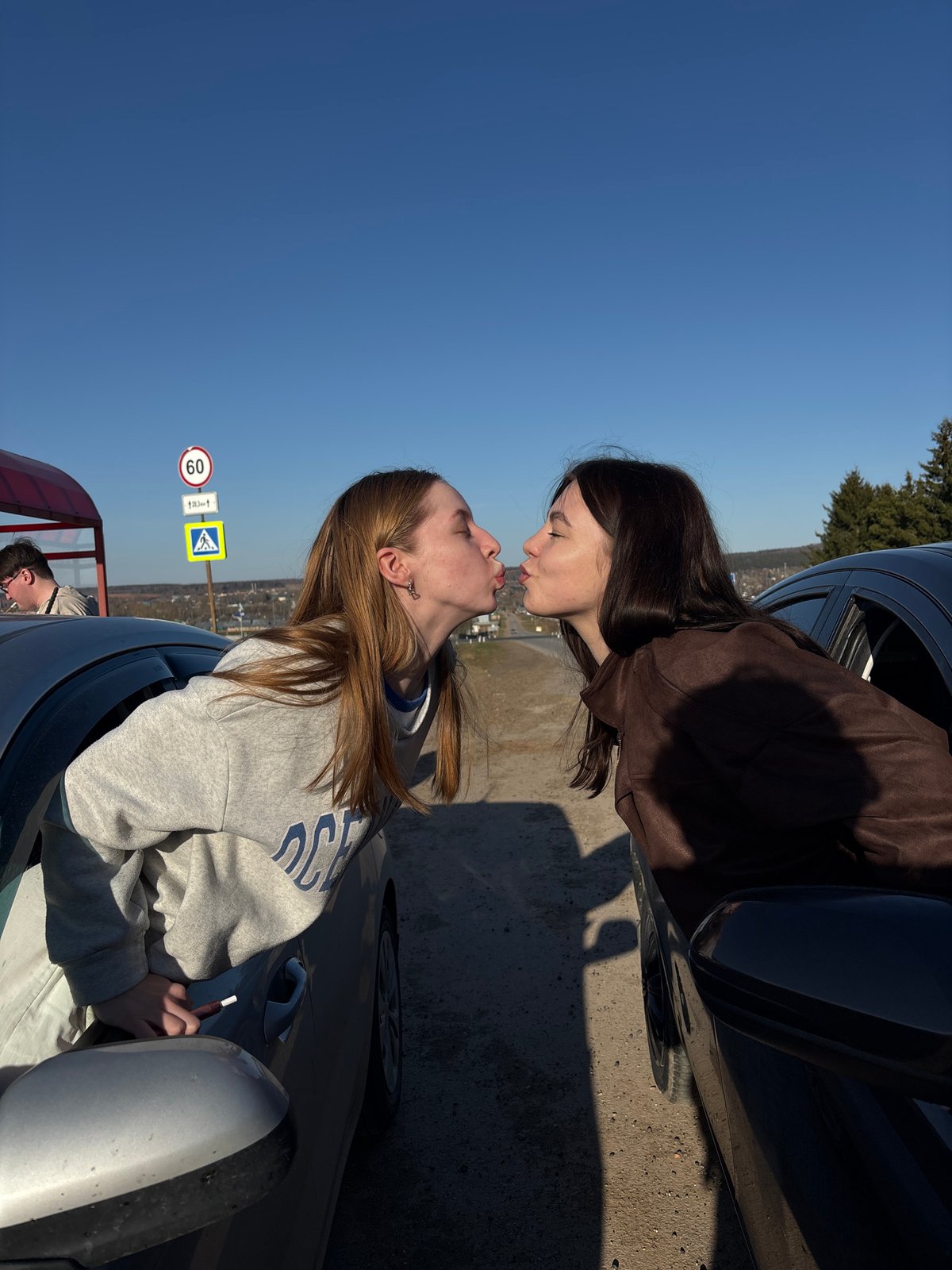 Casual social interactions observed in Russian village parking area