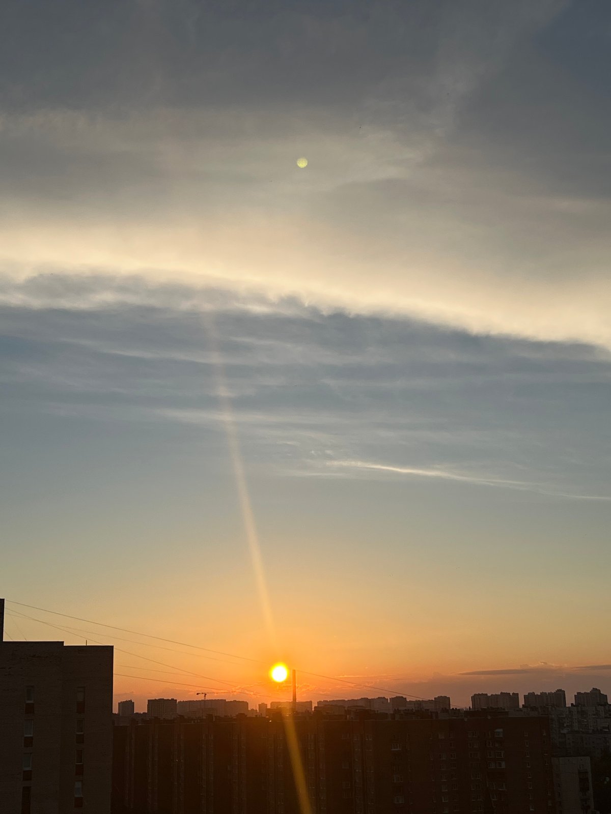 Midsummer sunset over Sinyavino apartment blocks, plus home life glimpses