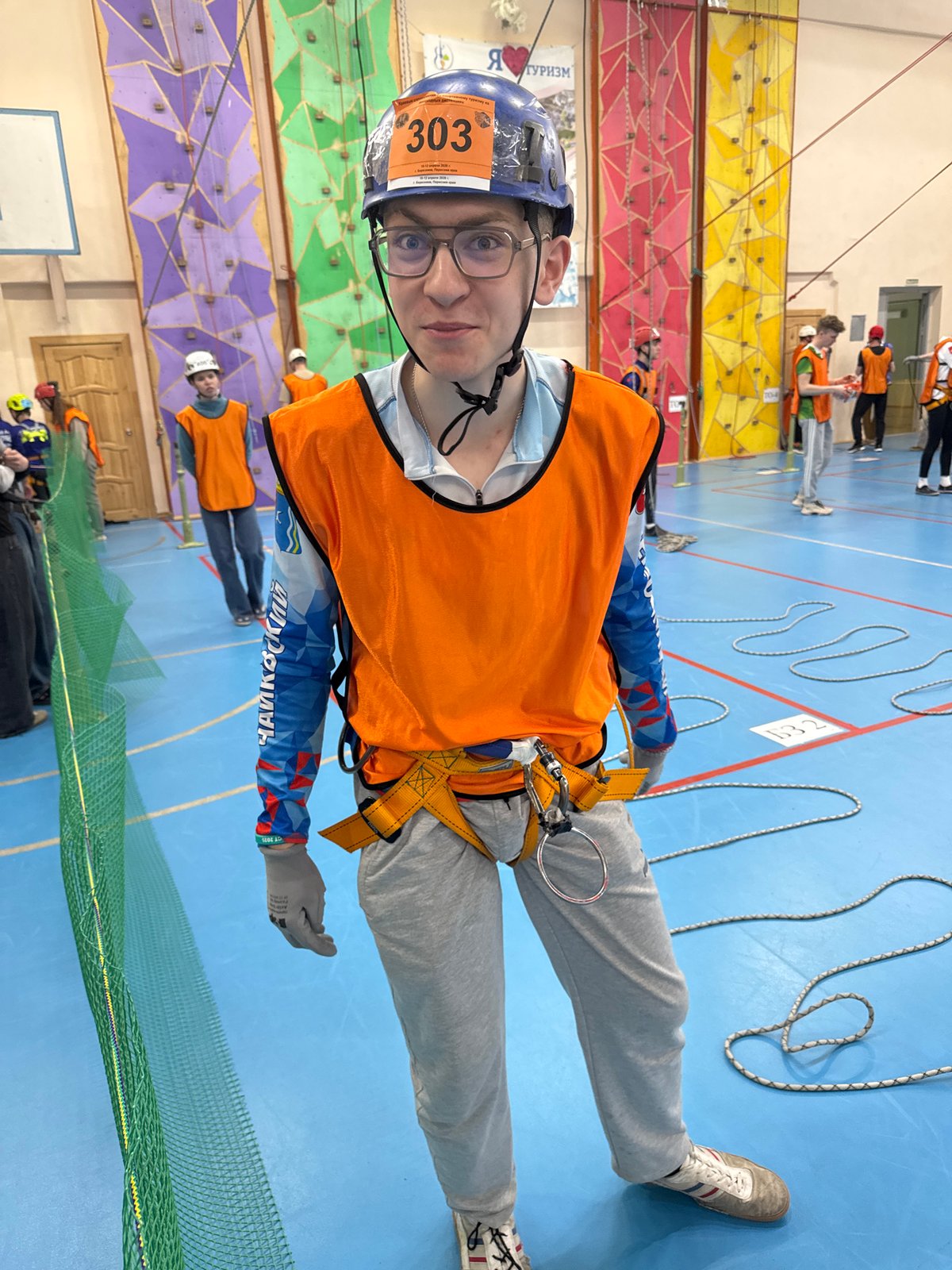 Climber in safety gear spotted at Berezniki gymnasium