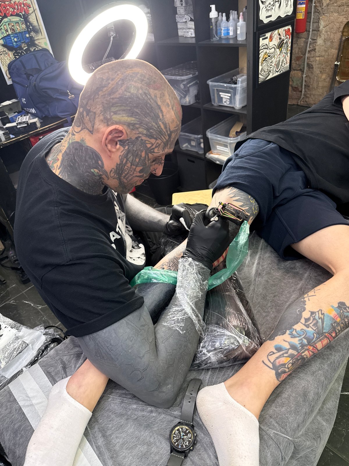 Tattoo session documented at Moscow studio
