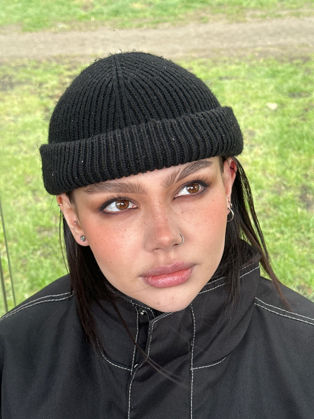 Young woman photographed in Moscow grassy area