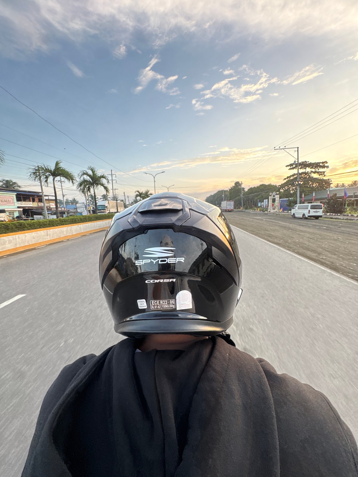 Motorcyclist documents sunset highway ride in Carmen, Philippines