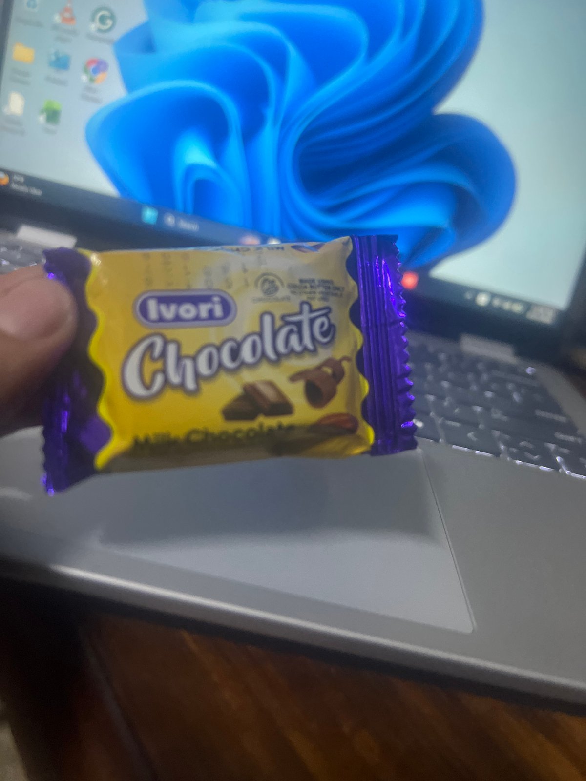 Person holds Ivori chocolate bar in Dar es-Salaam
