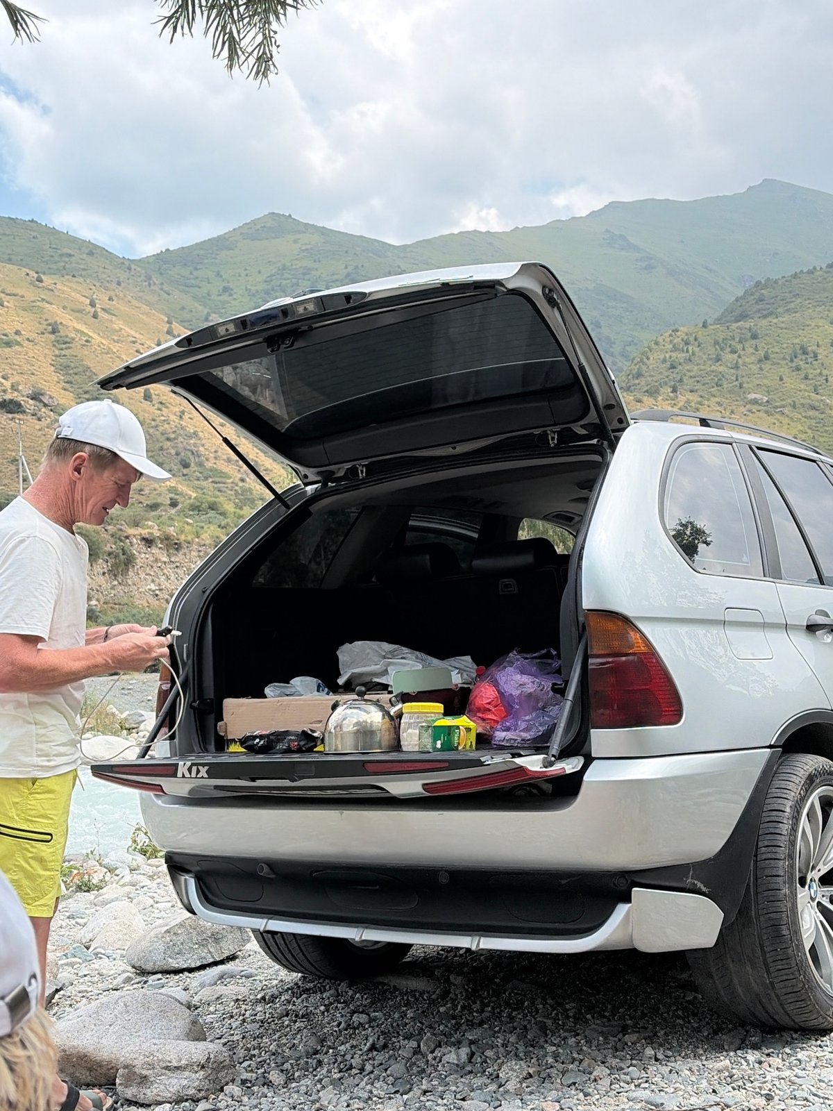 Riverside picnic break at a rocky mountain river