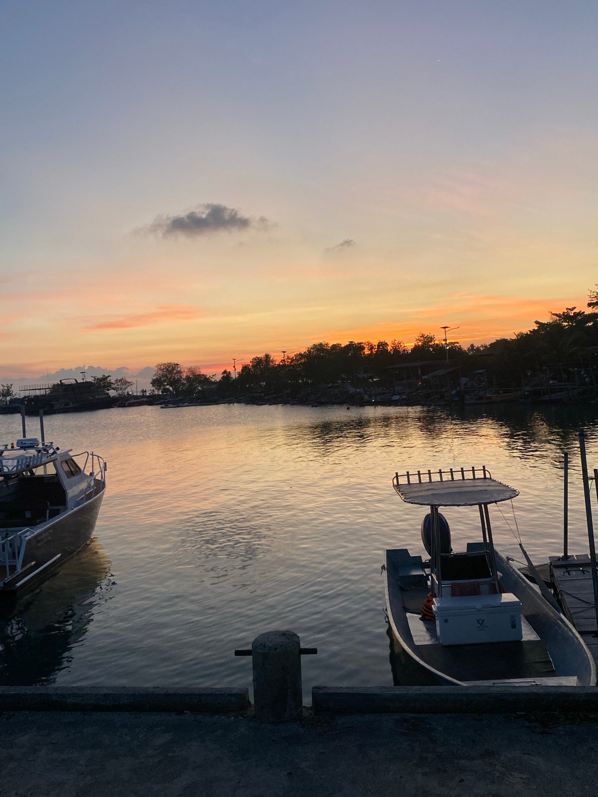 Golden hour waterfront scene documented in Baan Tai, Thailand