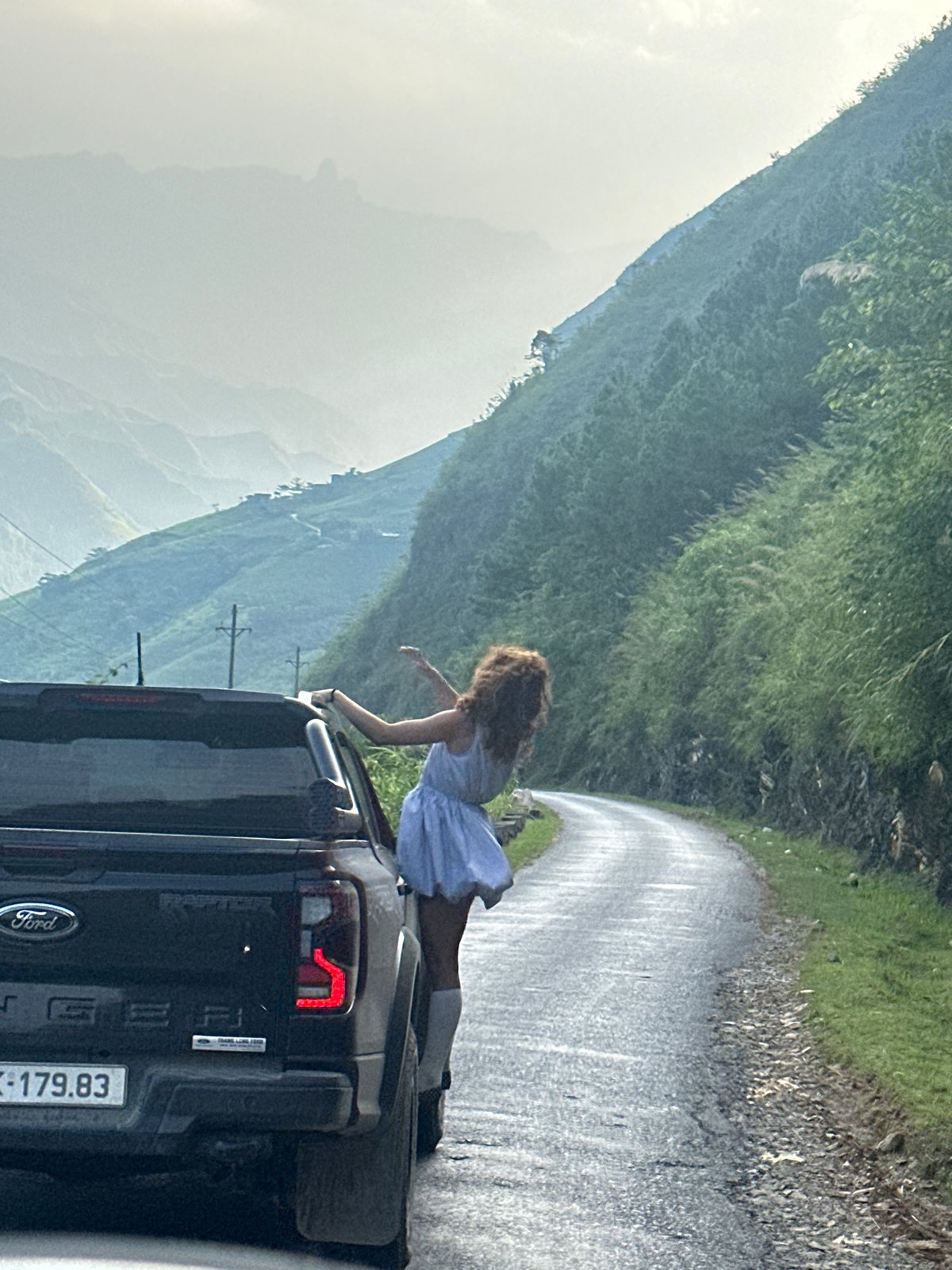 Travelers document morning journey through misty Du Già Commune roads