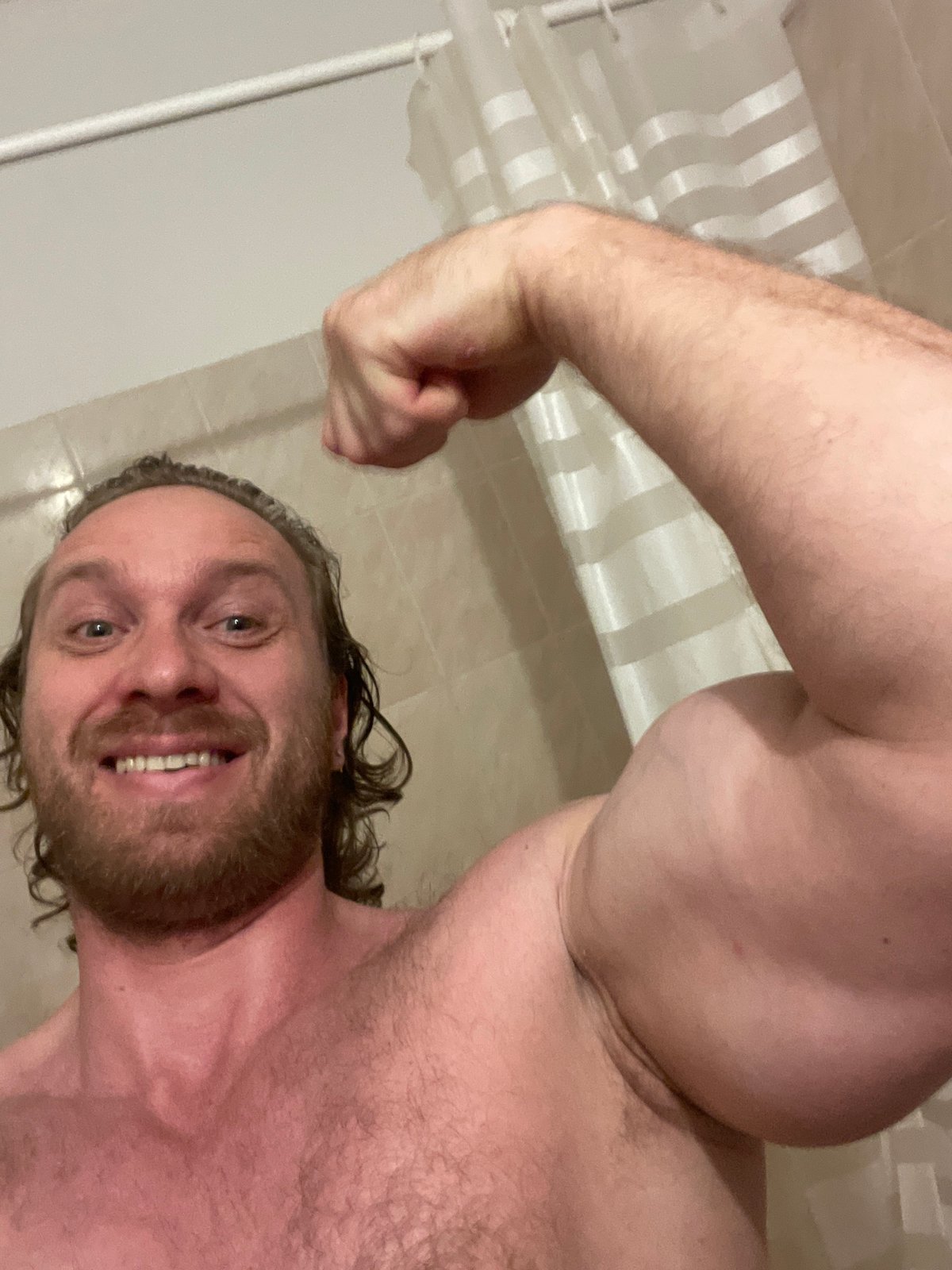 Casual flex pose at home in Saint Petersburg