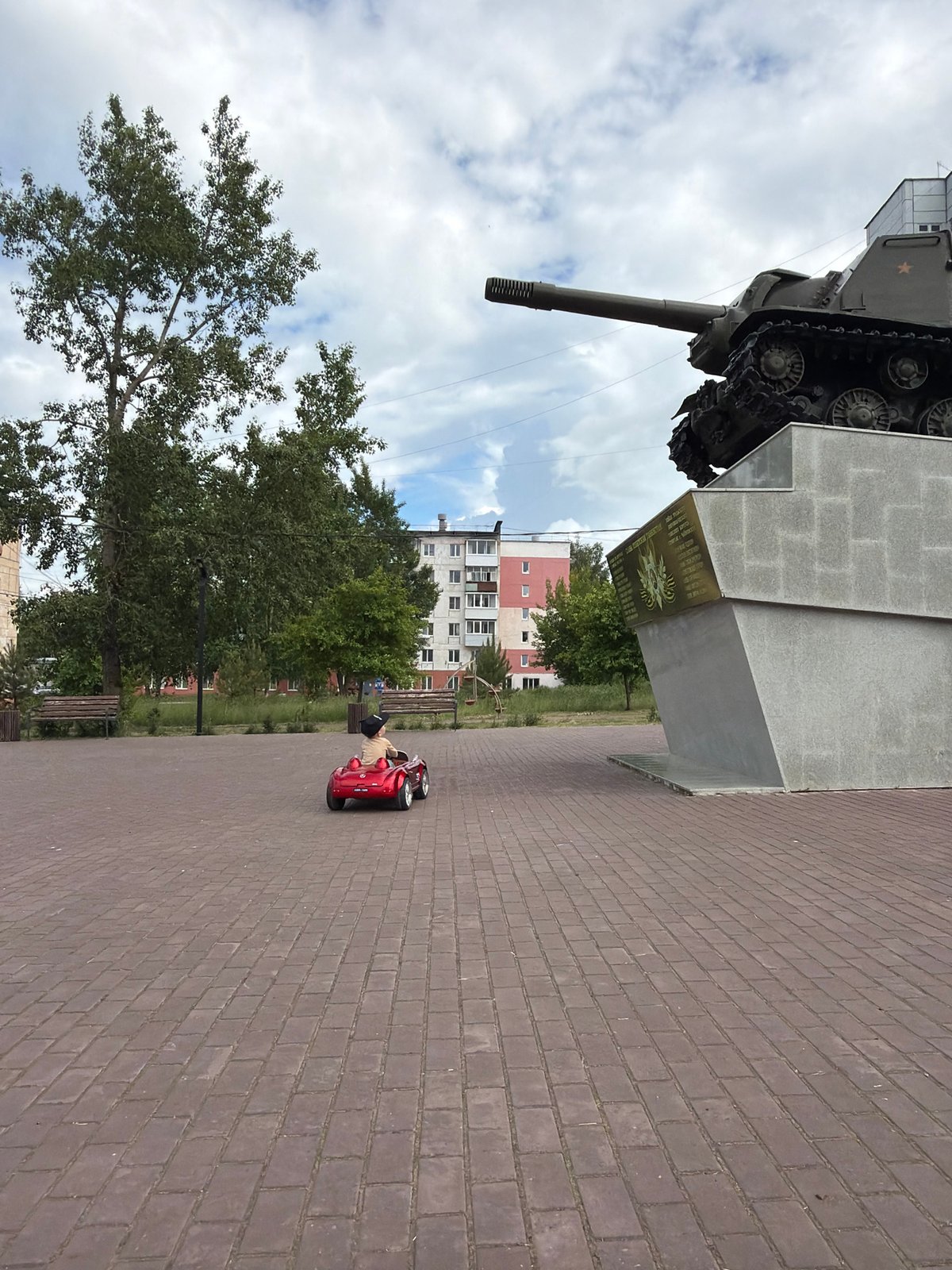 Everyday life captured around Soviet tank memorial in Chaikovsky