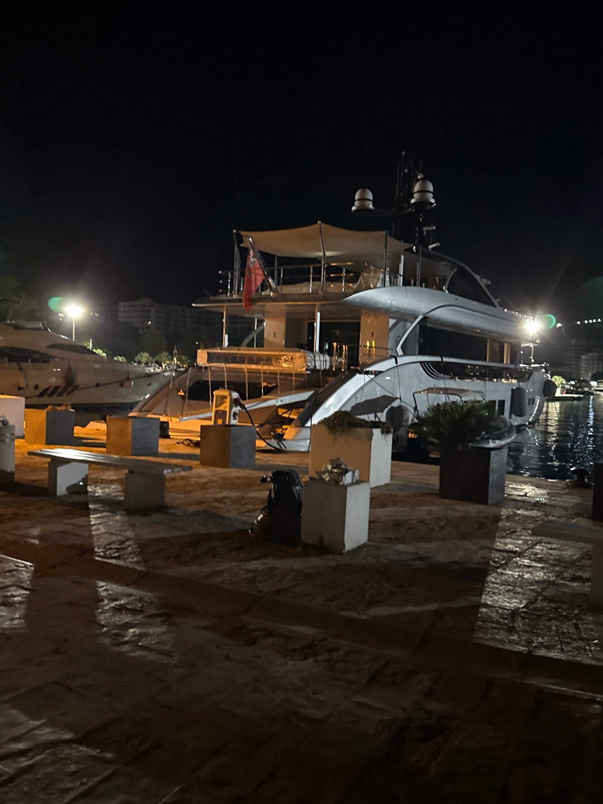 Late-night Budva waterfront: marina, promenade, and lit-up streets