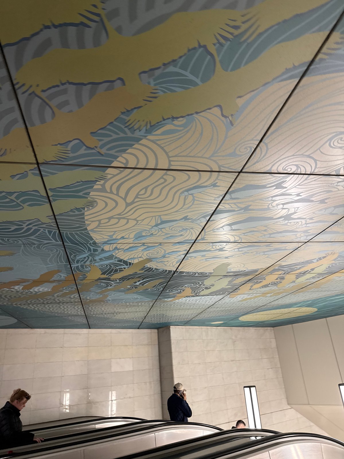 Bird and fish mural documented in Moscow Metro station