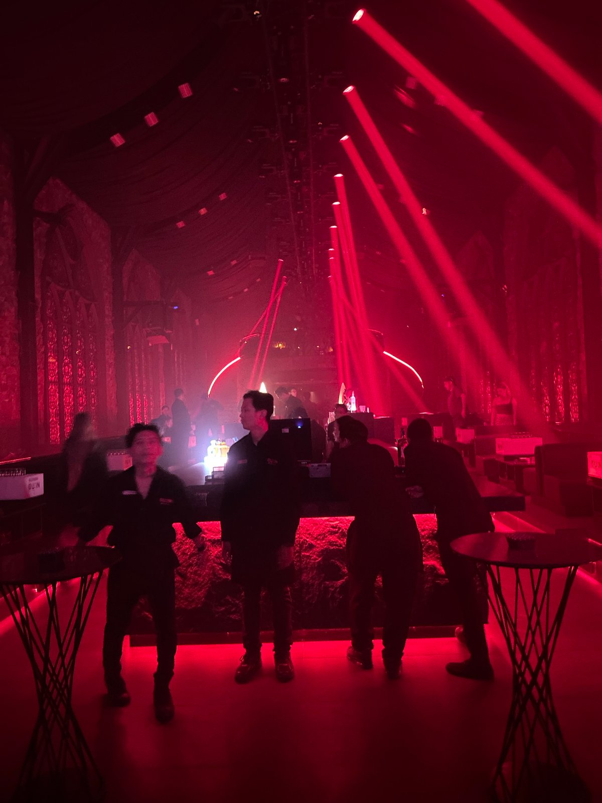 MU:IN Bali nightclub mid-show: costumed stage performance, red lights, full venue