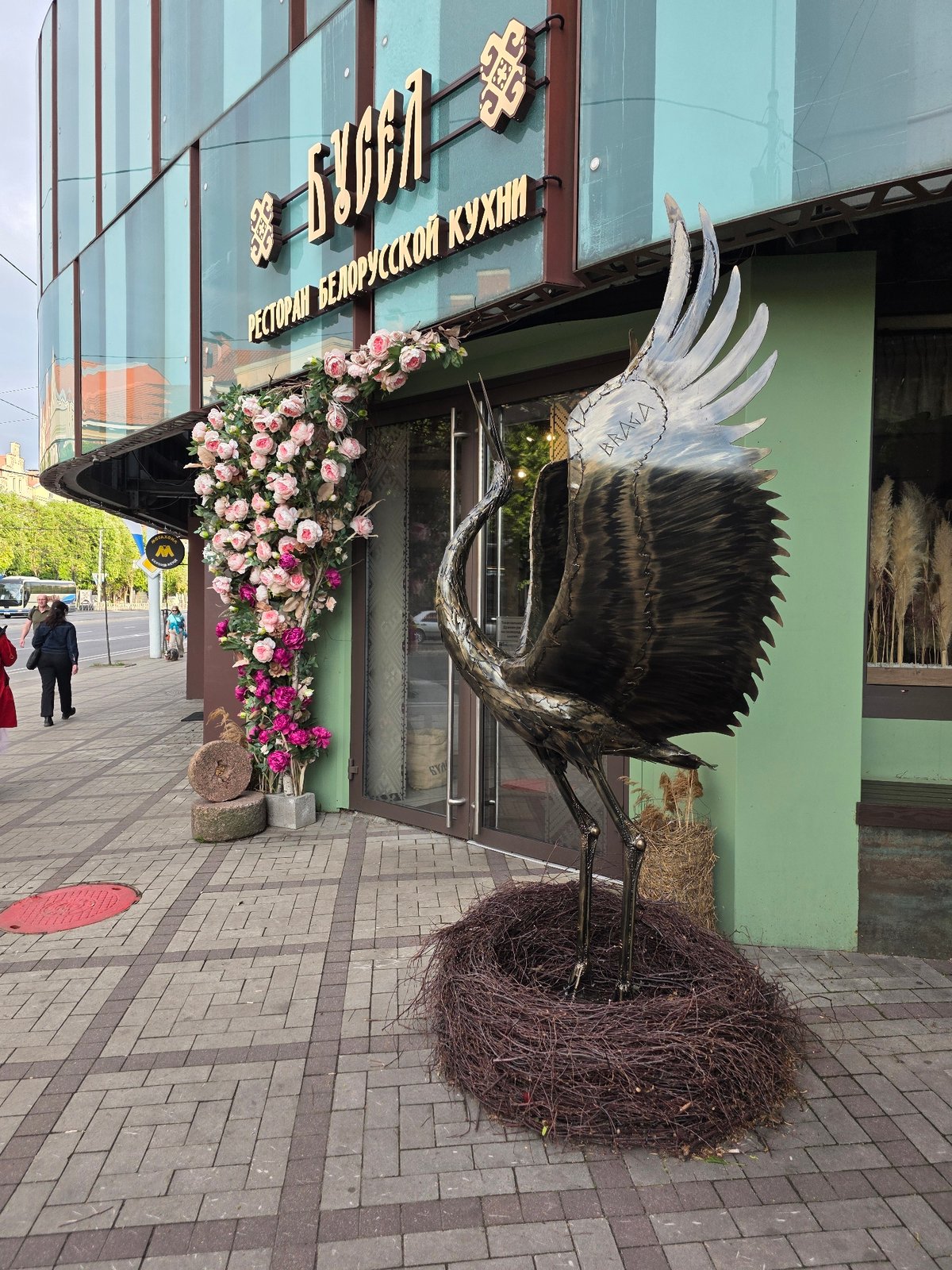 Metal crane sculpture observed outside Kaliningrad restaurant